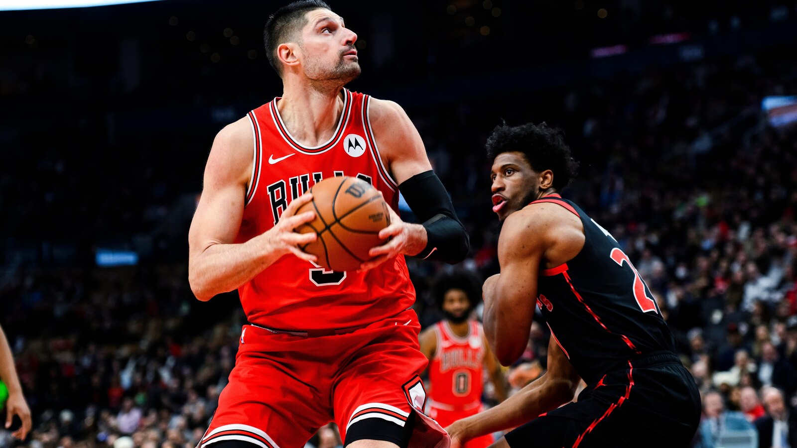 Vucevic and DeRozan each score 24 points to help Bulls beat Raptors 116-110