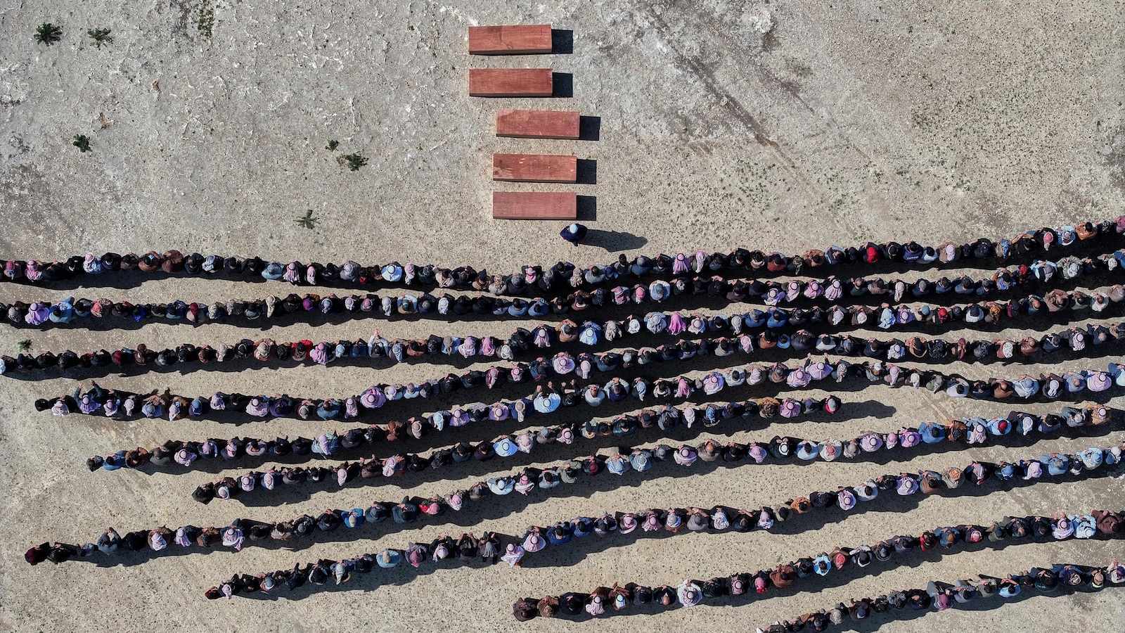 A Syrian man buries his wife and 4 children killed in Israeli strikes on Beirut