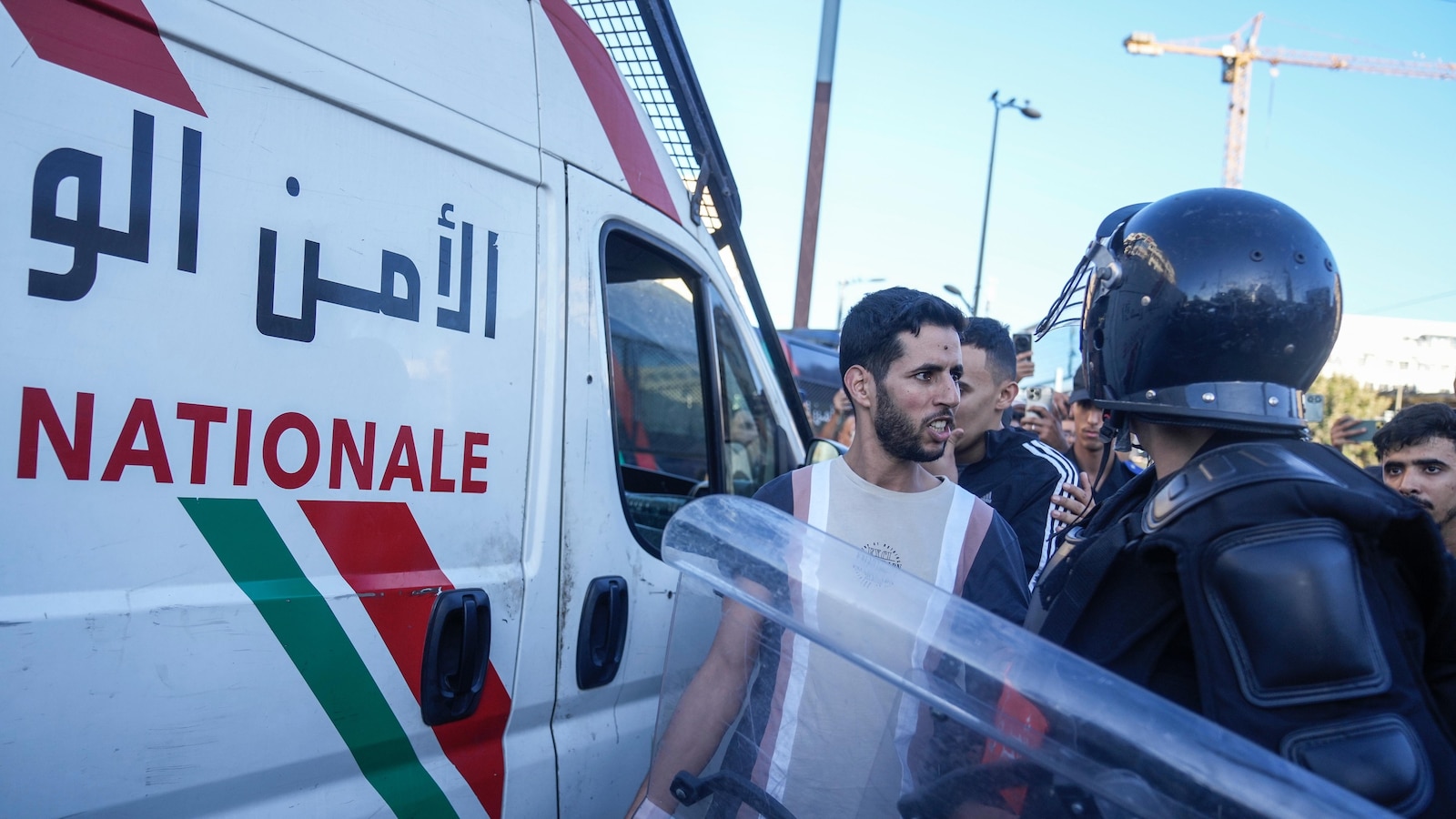 A police van injures protester as anti-government youth demonstrations turn violent in Morocco