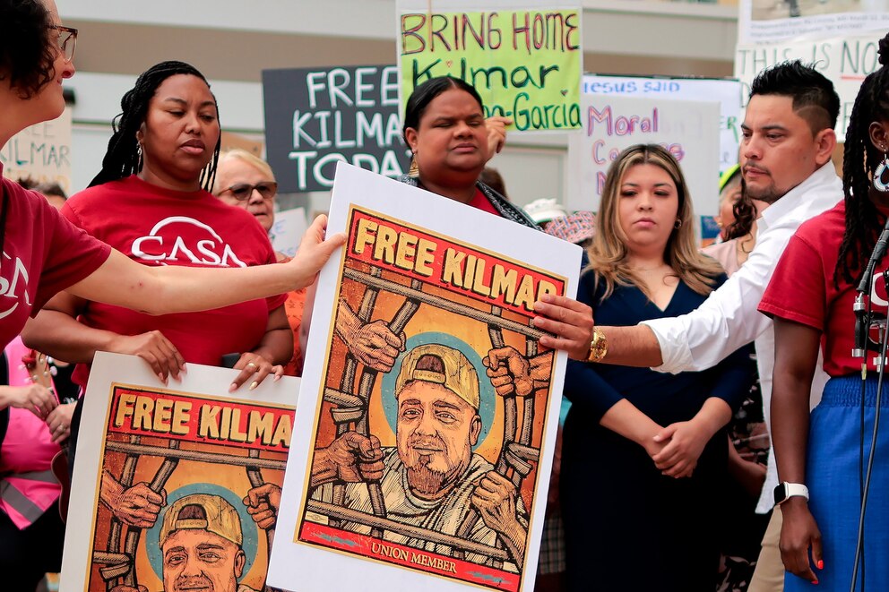 PHOTO: Jennifer Vasquez Sura (2nd R), the wife of Kilmar Abrego Garcia, rallies in front of the U.S. District Court for Maryland ahead of a hearing on his case, on July 7, 2025, in Greenbelt, Maryland. 