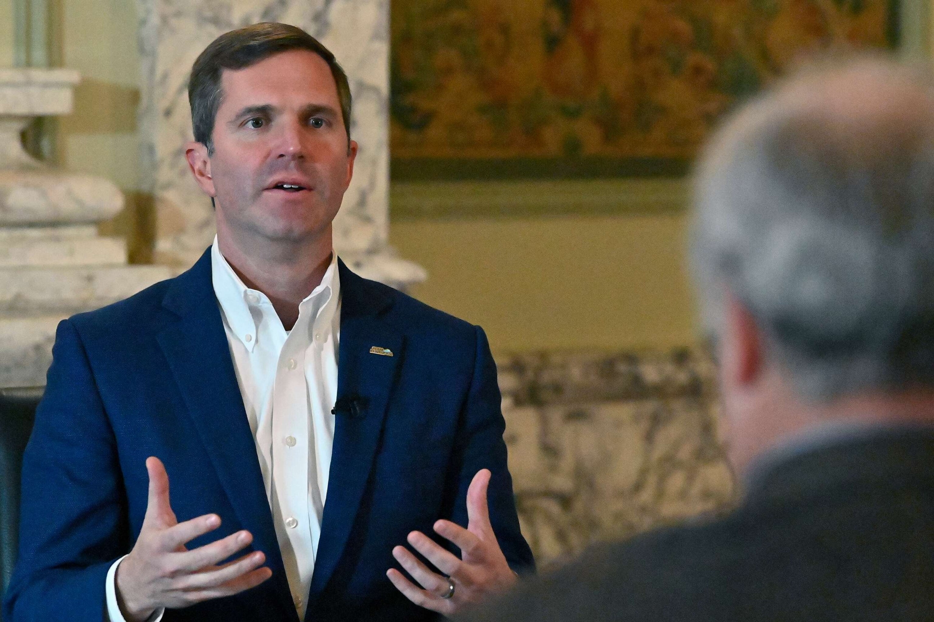 PHOTO: Kentucky Governor Andy Beshear answers questions during an interview at the Kentucky State Capitol in Frankfort, Ky., on Dec. 7, 2022.