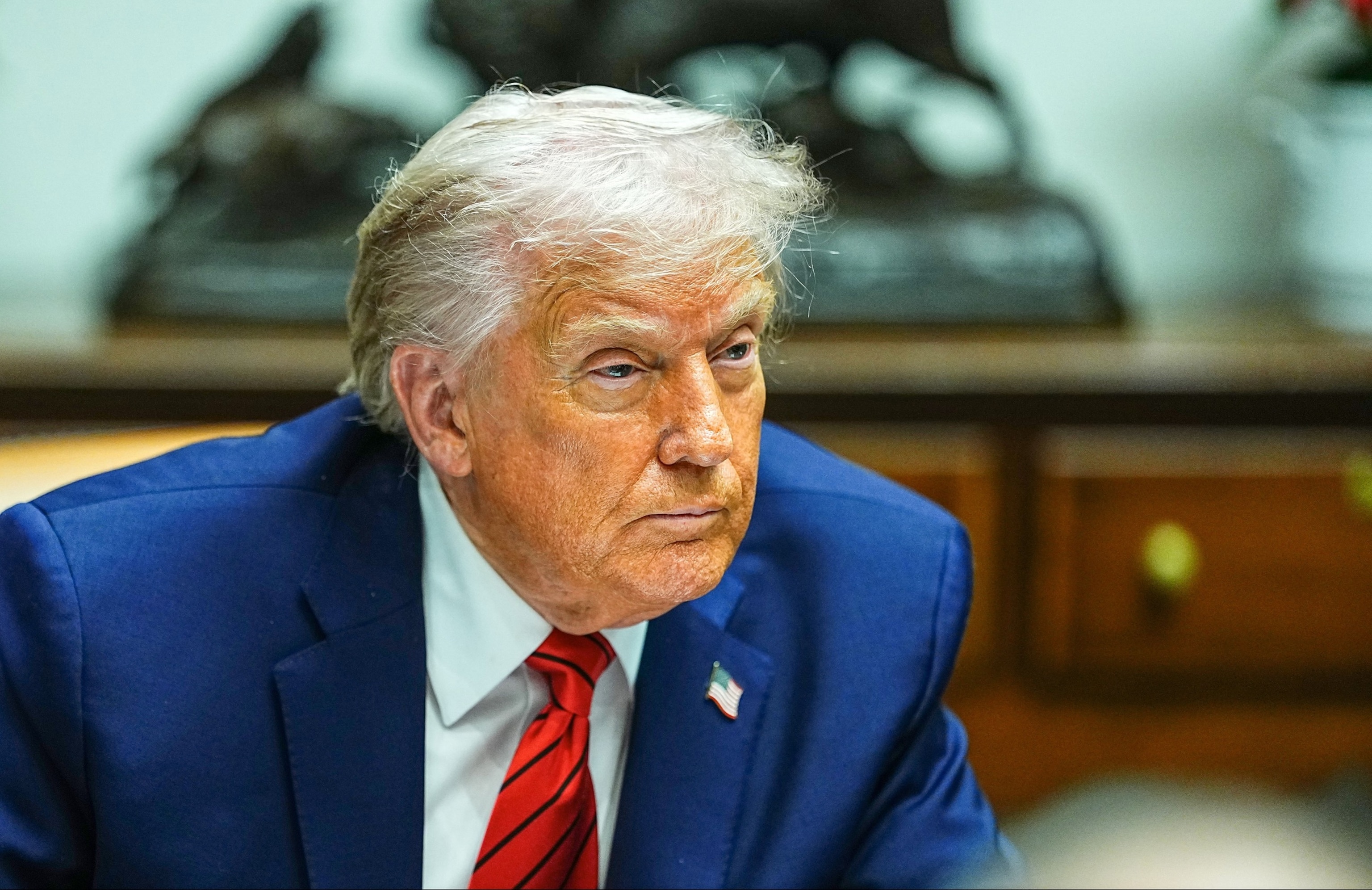 PHOTO: President Donald J Trump manswers reporters questions during a roundtable with high-tech business executives in the Roosevelt Room of the White House in Washington, December 10, 2025.