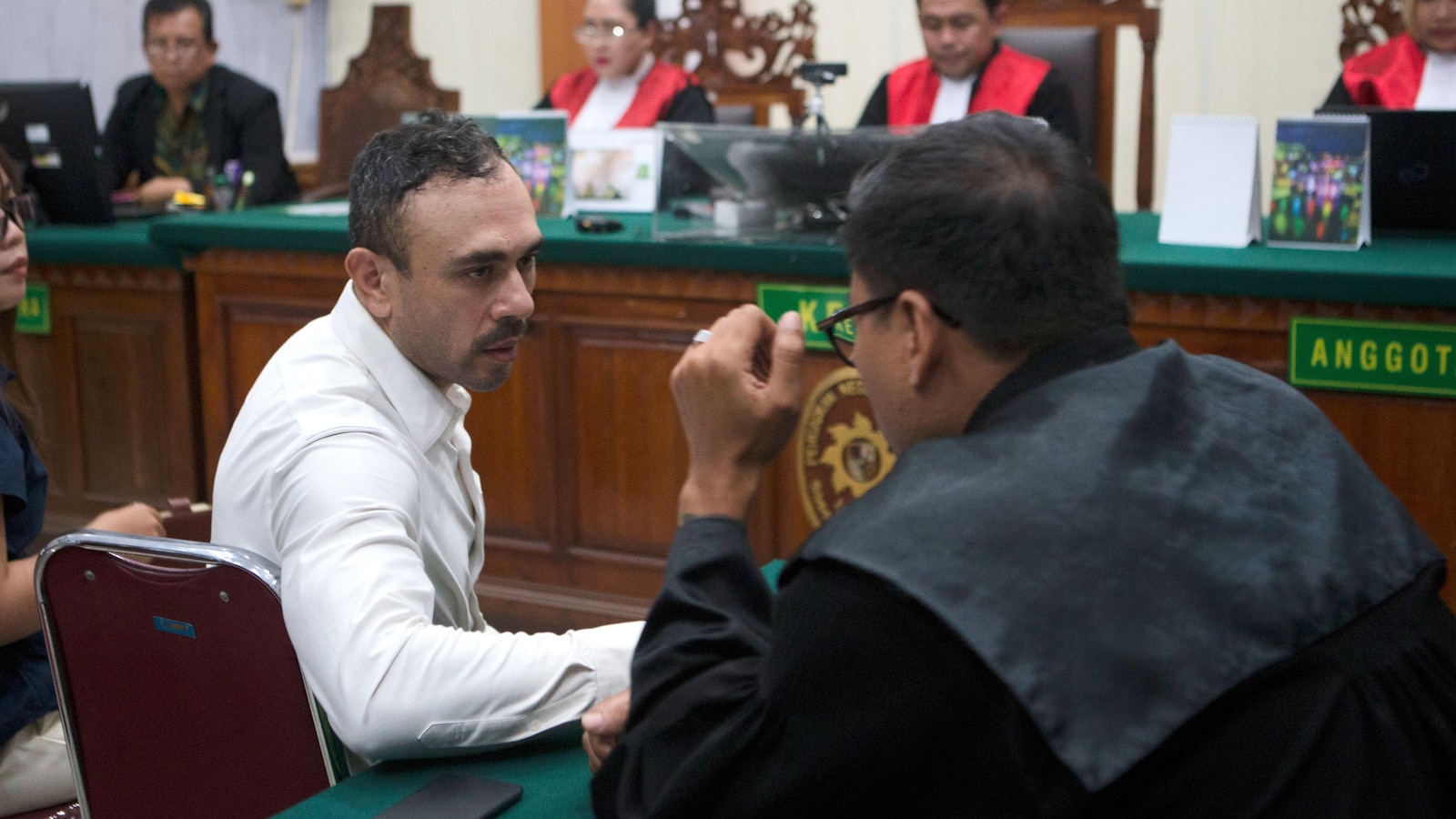 Indonesian court sentences an Australian to 12 years in prison for smuggling cocaine to Bali