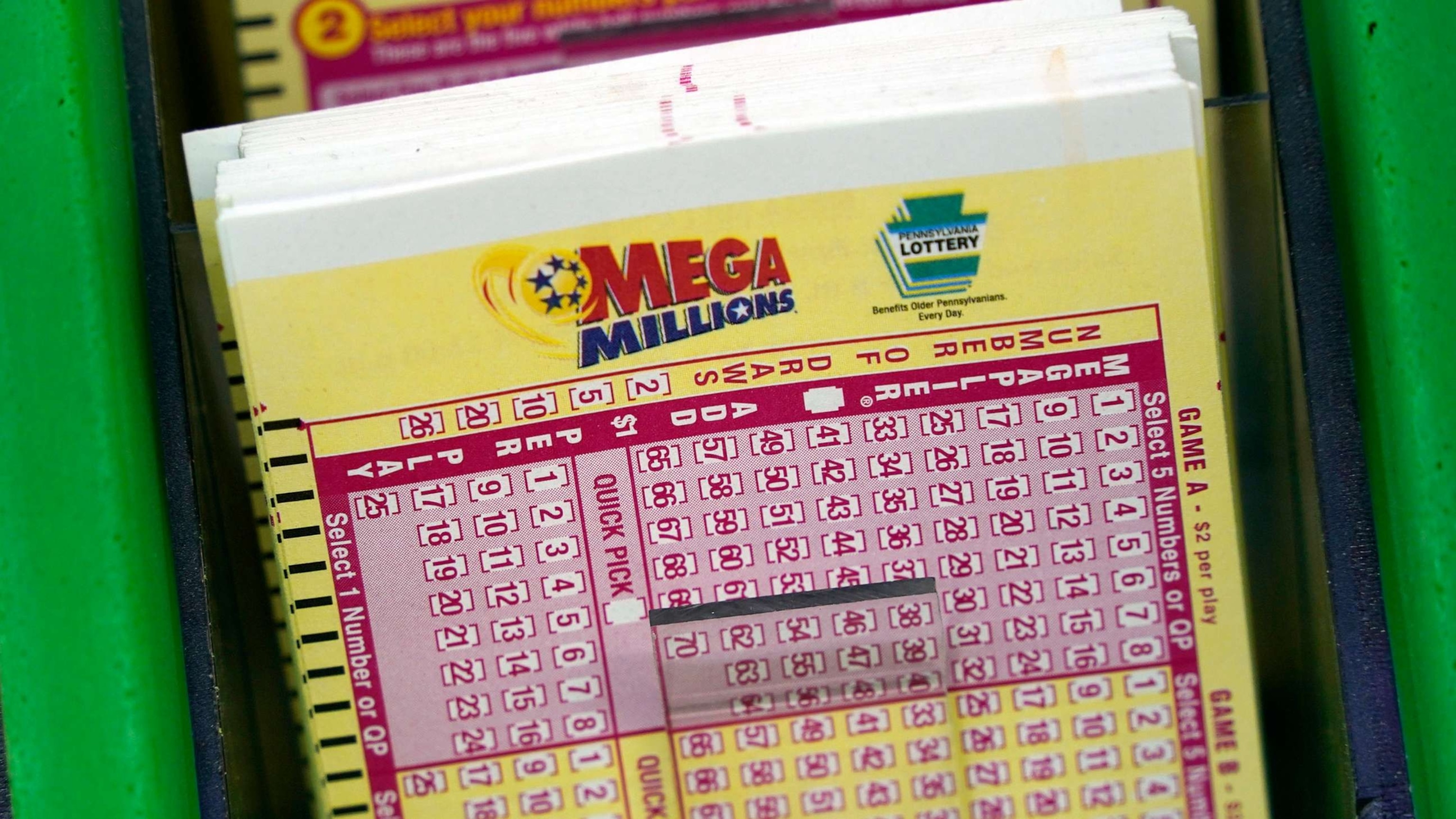 PHOTO: In this Jan. 9, 2023, file photo, Mega Millions cards are displayed at the Fuel On Convenience store in Pittsburgh, Pa.