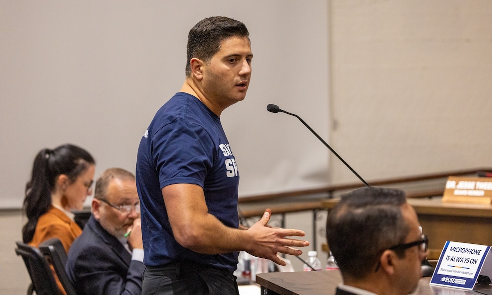 PHOTO: Assemblymember Bill Essayli speaks during community comments discussing the issue of transgender athletes competing in girls high school sports at the Riverside Unified School District meeting, Dec. 19, 2024. 