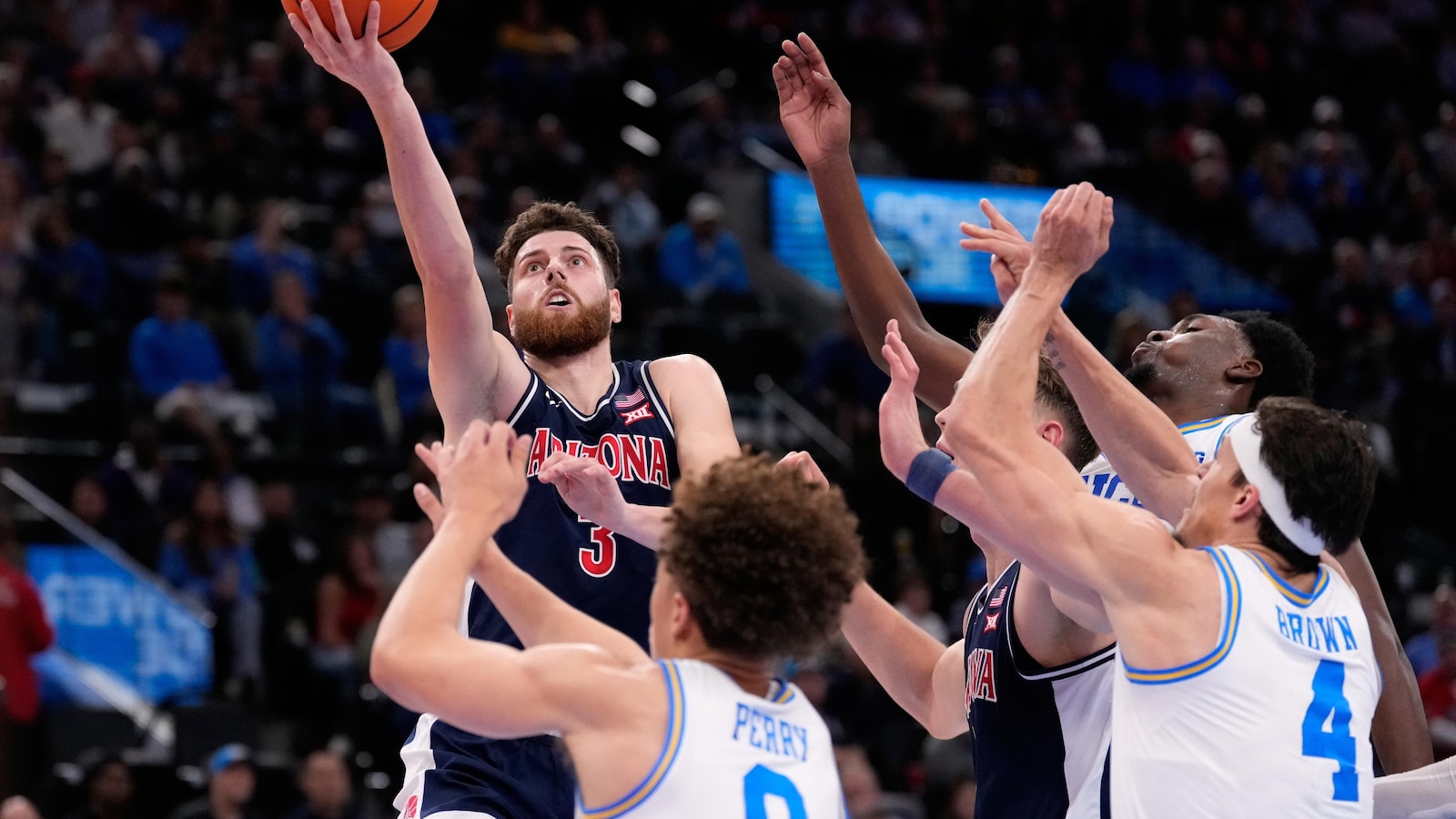 Dell'Orso scores 20 off the bench as No. 5 Arizona beats No. 15 UCLA 69-65 in Hall of Fame Series