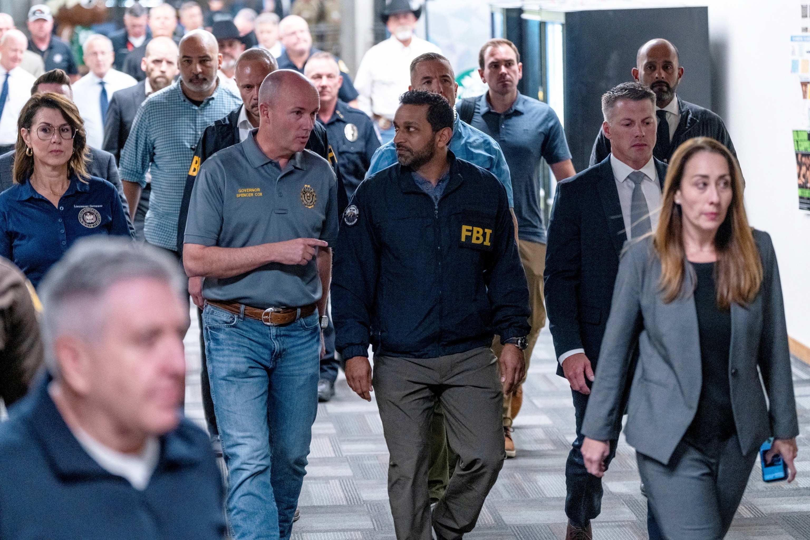PHOTO: FBI Director Kash Patel walks with Utah Governor Spencer Cox as he visits the scene at the Utah Valley University,  in Orem, Utah, Sept. 11, 2025.