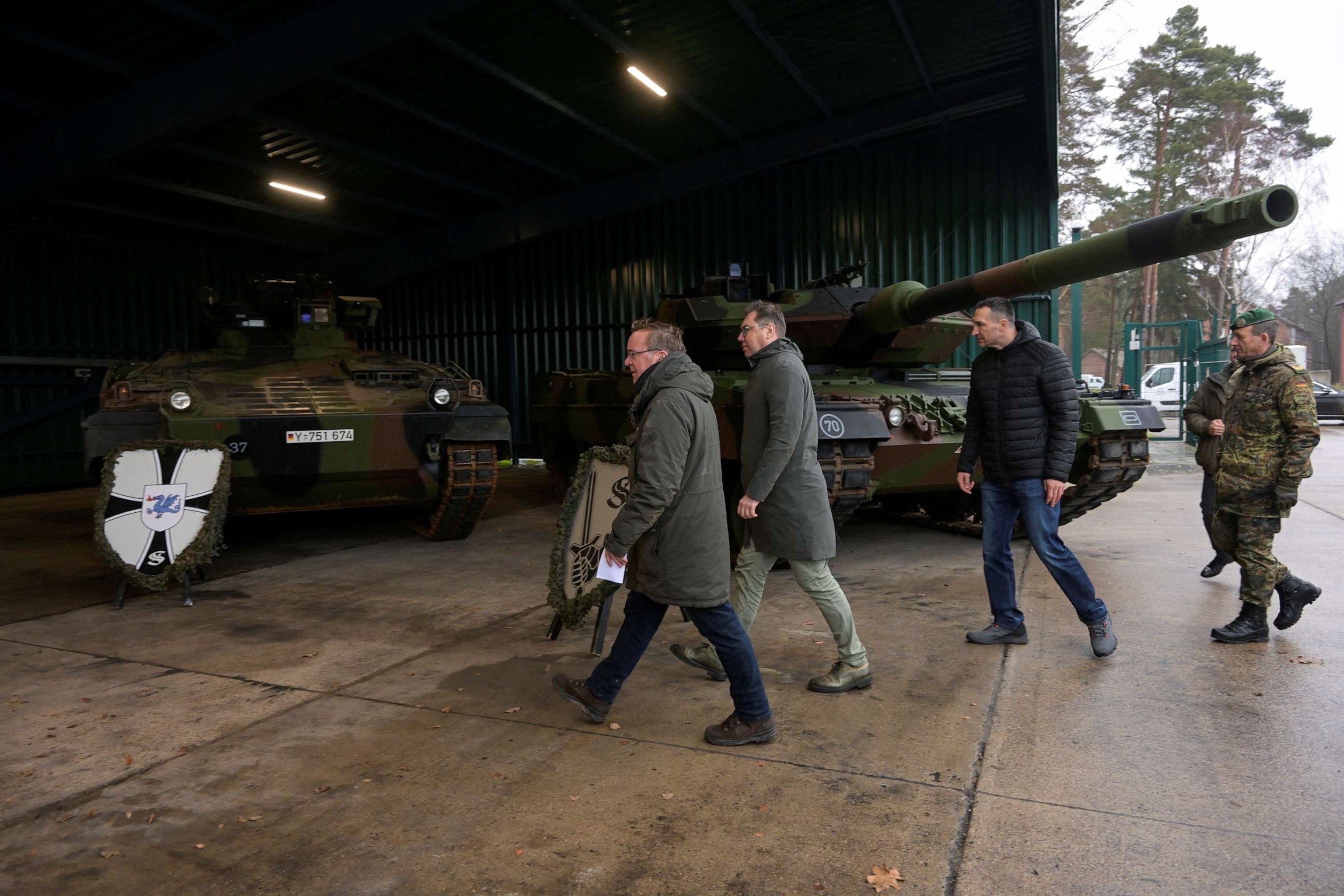 PHOTO: Kyiv Mayor Wladimir Klitschko, German Defence Minister Boris Pistorius and Ukrainian Ambassador to Germany Oleksii Makeiev visit a training site in Munster, Germany, Feb. 20, 2023.