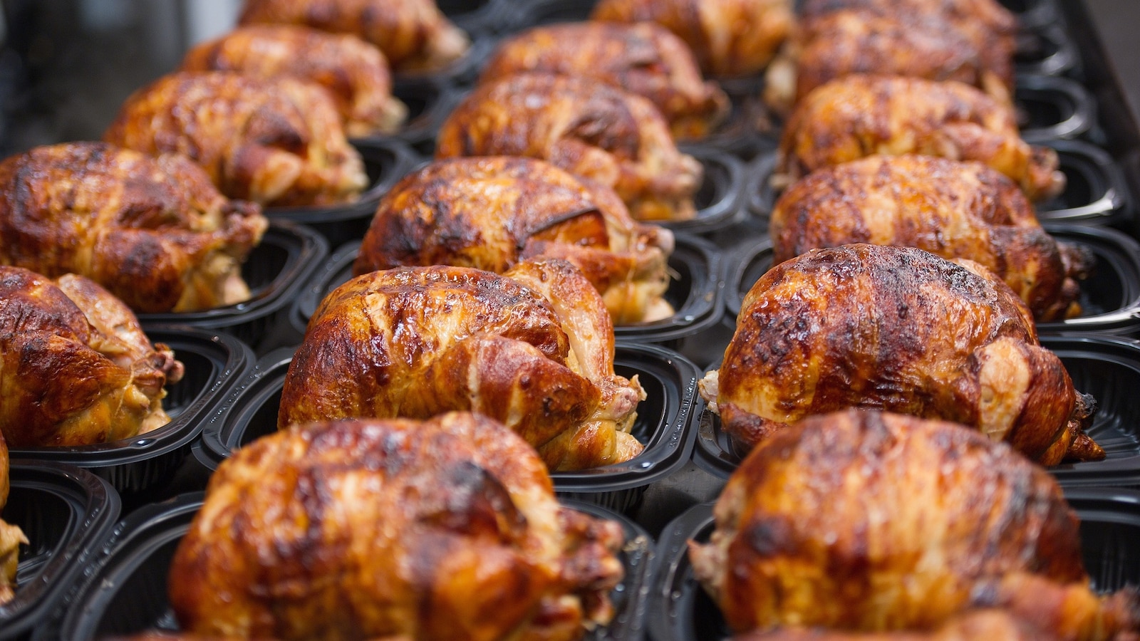 Cooked rotisserie chickens are displayed for sale at a Costco Wholesale Corp. store in San Francisco, Dec. 6, 2011. 