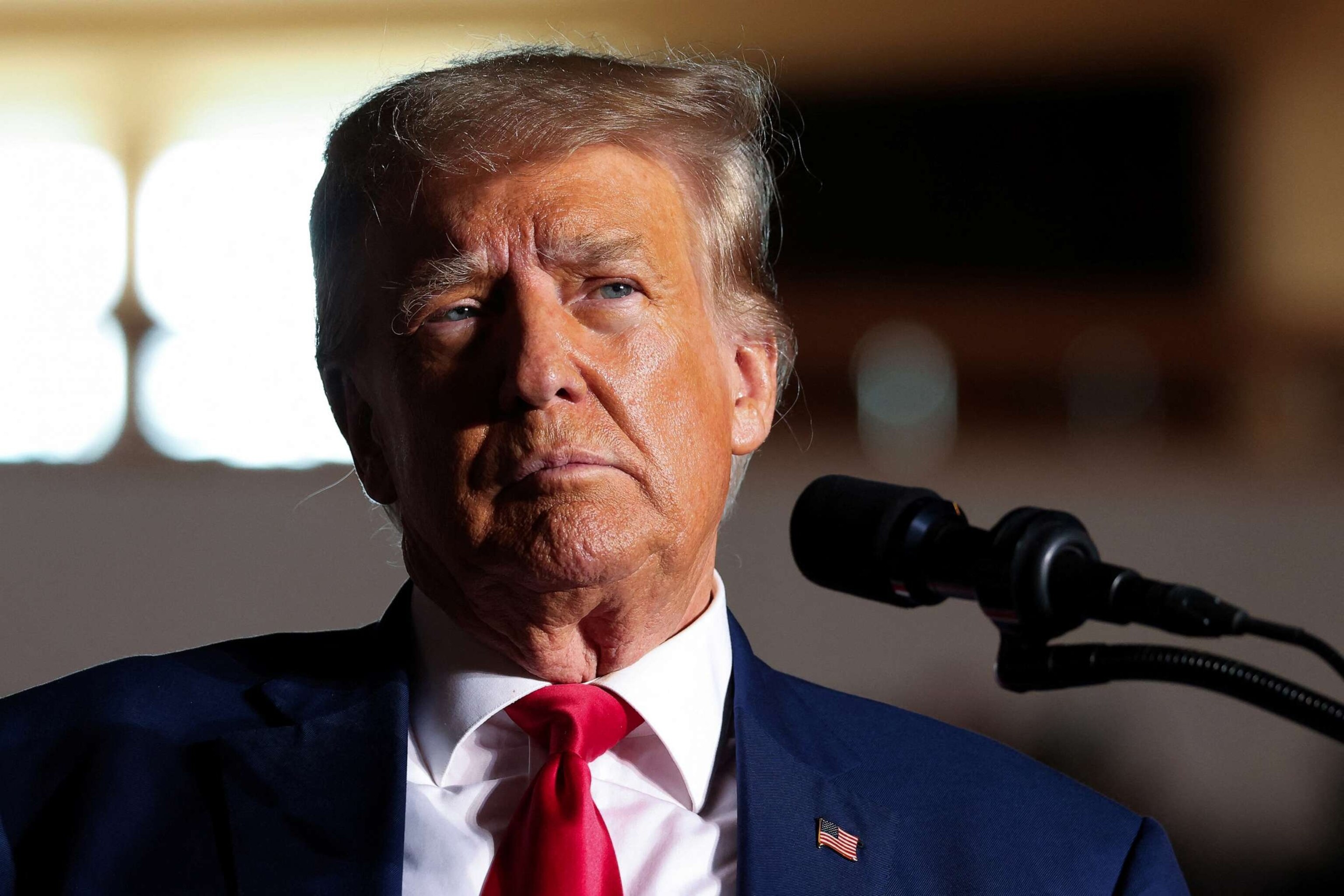 PHOTO: Former President and Republican presidential candidate Donald Trump reacts as he holds a campaign rally in Erie, Pa., on July 29, 2023.