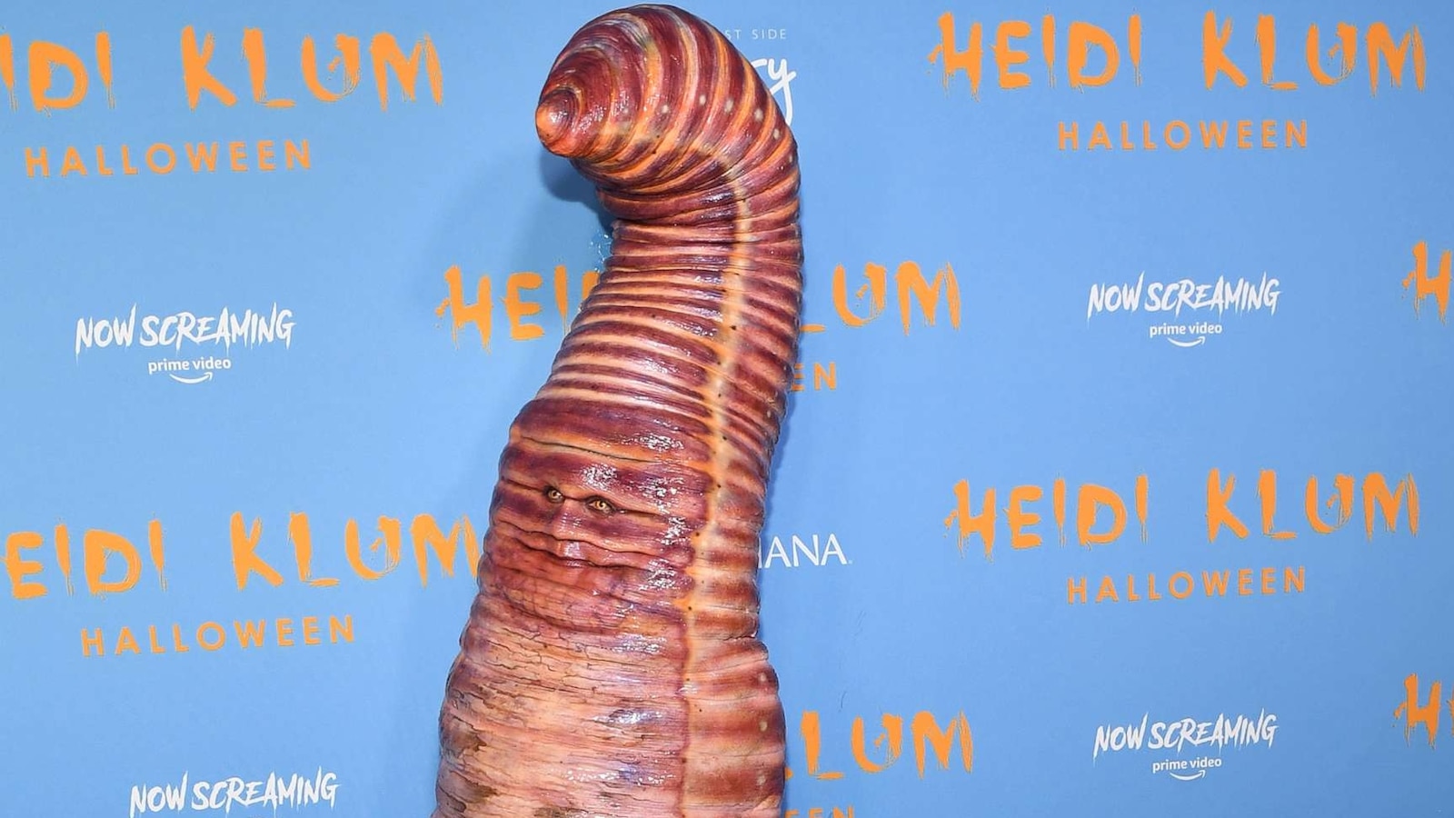 lady dressed as worm Heidi Klum dresses giant for Halloween label_us_USA 2 DAY DELIVERY