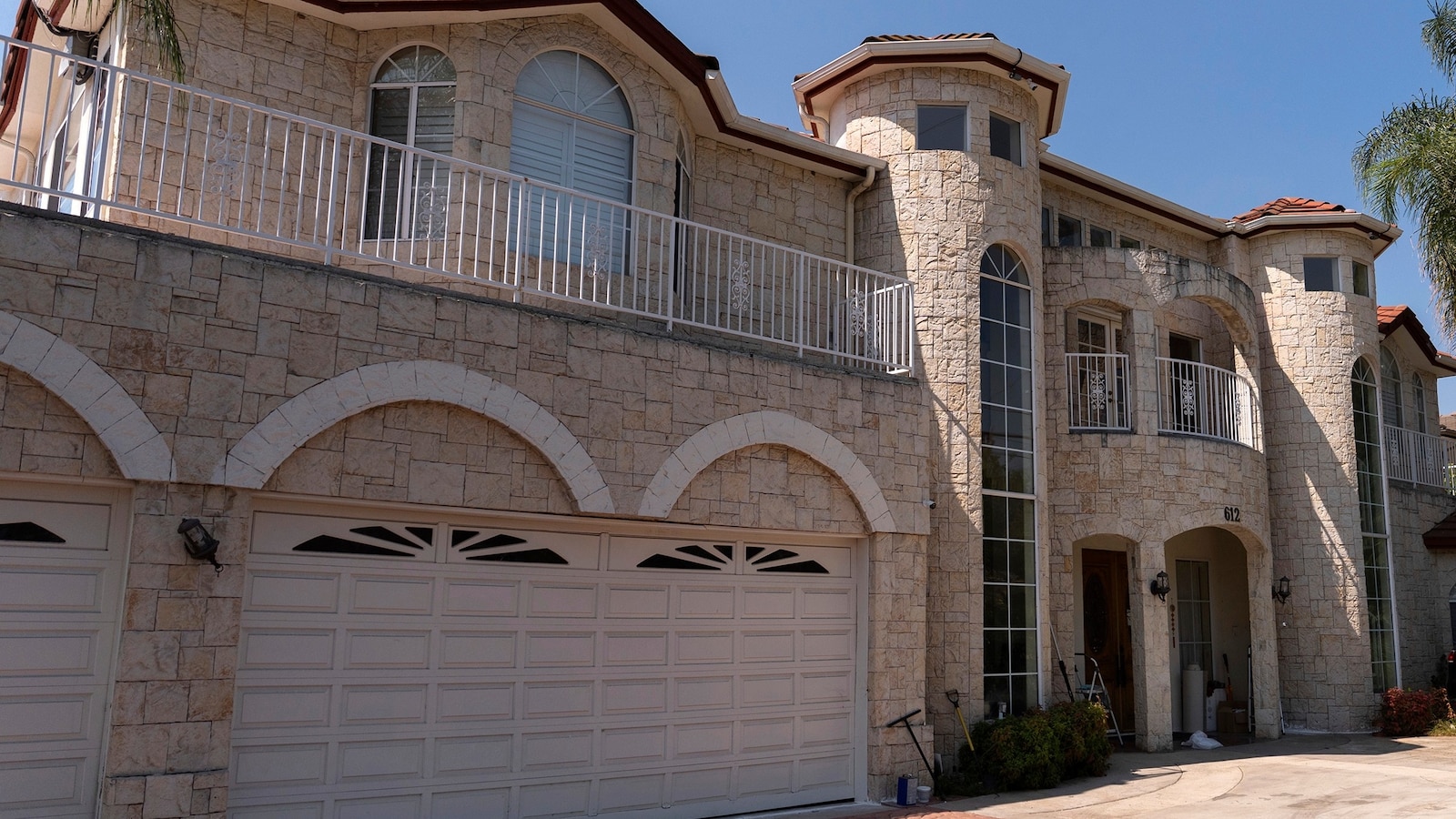 A California couple faces multiple felony charges in what prosecutors called an unprecedented case of child abuse involving over a dozen children born via surrogacy in their Los Angeles County mansion.