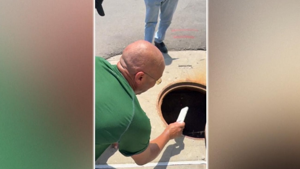 WATCH: Dad's sewer rescue mission for daughter's phone goes viral