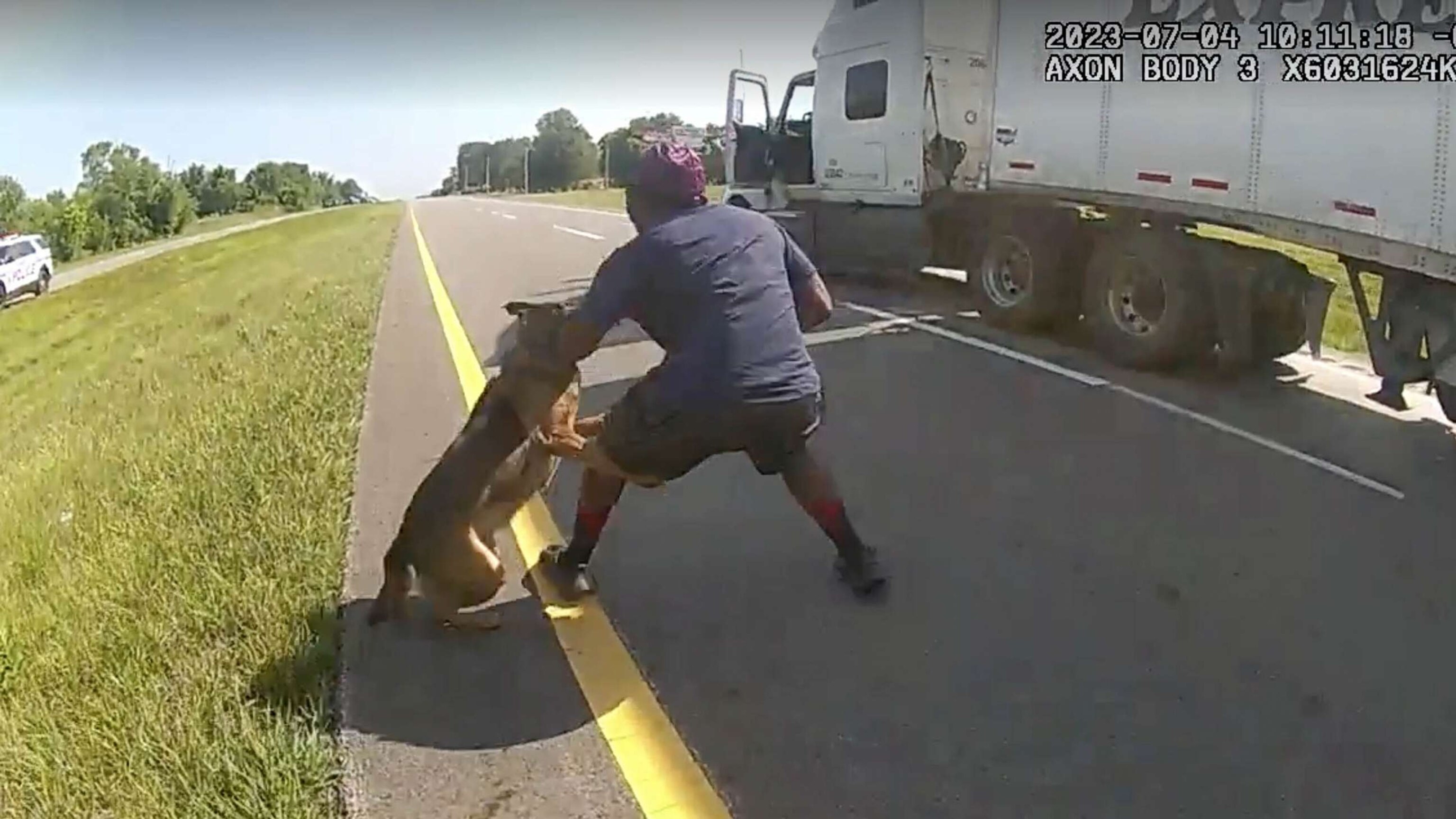 A police dog attacked a Black trucker on his knees. An Ohio city