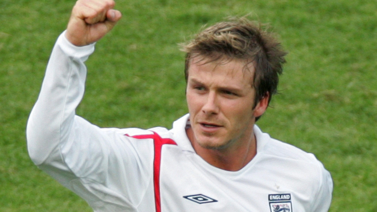 David Beckham celebrates after he scored the game's first goal off a free kick during the round of 16 World Cup football match between England and Ecuador at Stuttgart's Gottlieb-Daimler Stadium, June 25, 2006, in Stuttgart, Germany. 