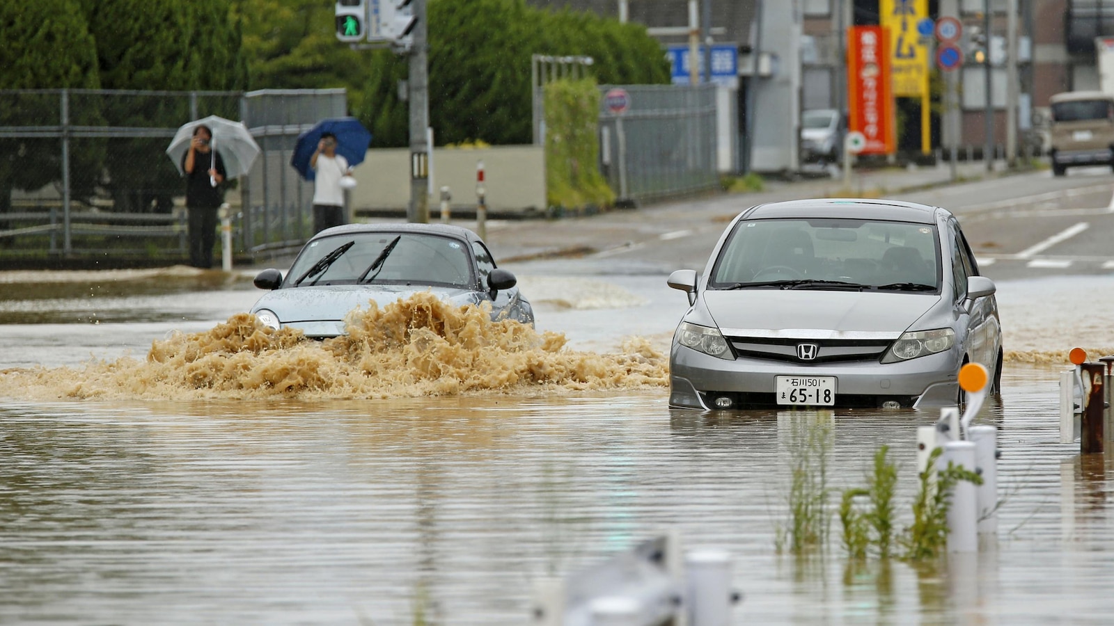 Photo: www-cdn.abcnews.com Heavy Rain and Flooding Strand Residents in North-Central Japan