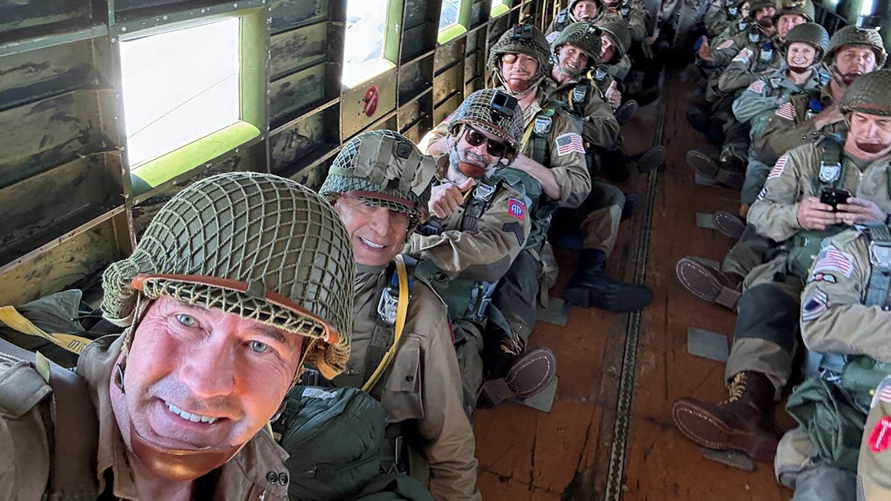 9 members of Congress parachute jump over Normandy for D-Day