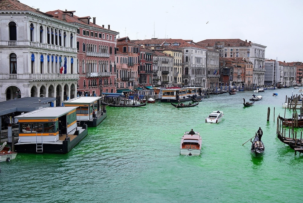 PHOTO: The Grand Canal in Venice after the canals were dyed green during the "Stop Ecocide" demonstration organized by Extinction Rebellion, Nov. 22, 2025. 