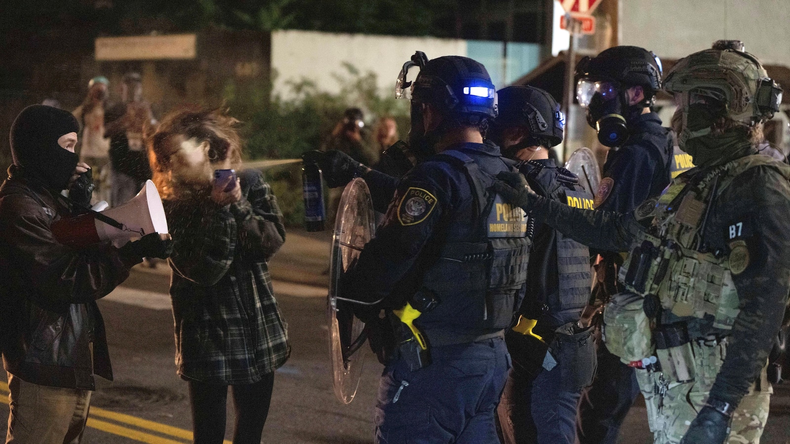 Portland braces for federal troops as protests escalate and a conservative influencer is arrested