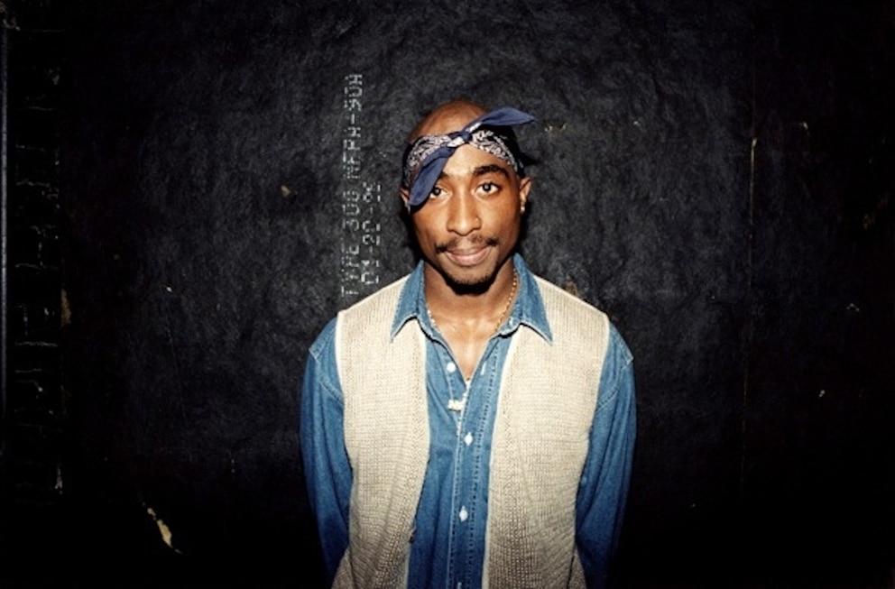 PHOTO: Rapper Tupac Shakur poses for photos backstage after his performance at the Regal Theater in Chicago, March 1994.