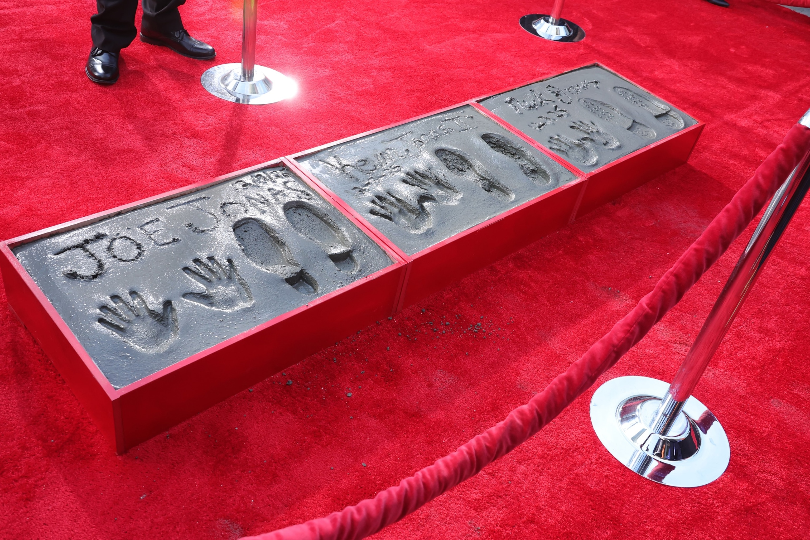 PHOTO: Jonas Brothers Hand And Footprint In Cement Ceremony At TCL Chinese Theater