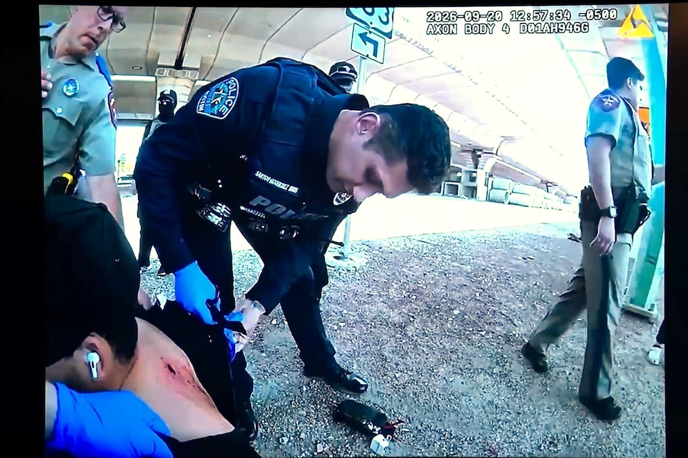 PHOTO: In this image taken from an Austin Police Department officer's body camera video shown at a news conference, September 22, 2026, officers inspect Wilber Rafael Garces Perez's wound after he was shot by an ICE agent.