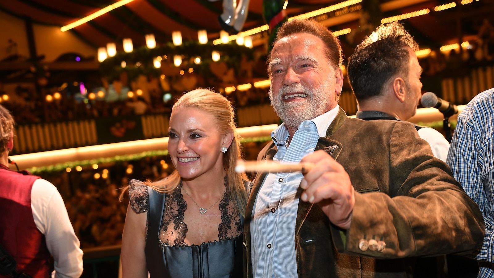 Arnold Schwarzenegger Conducts Band at Munich Oktoberfest Attended by Millions