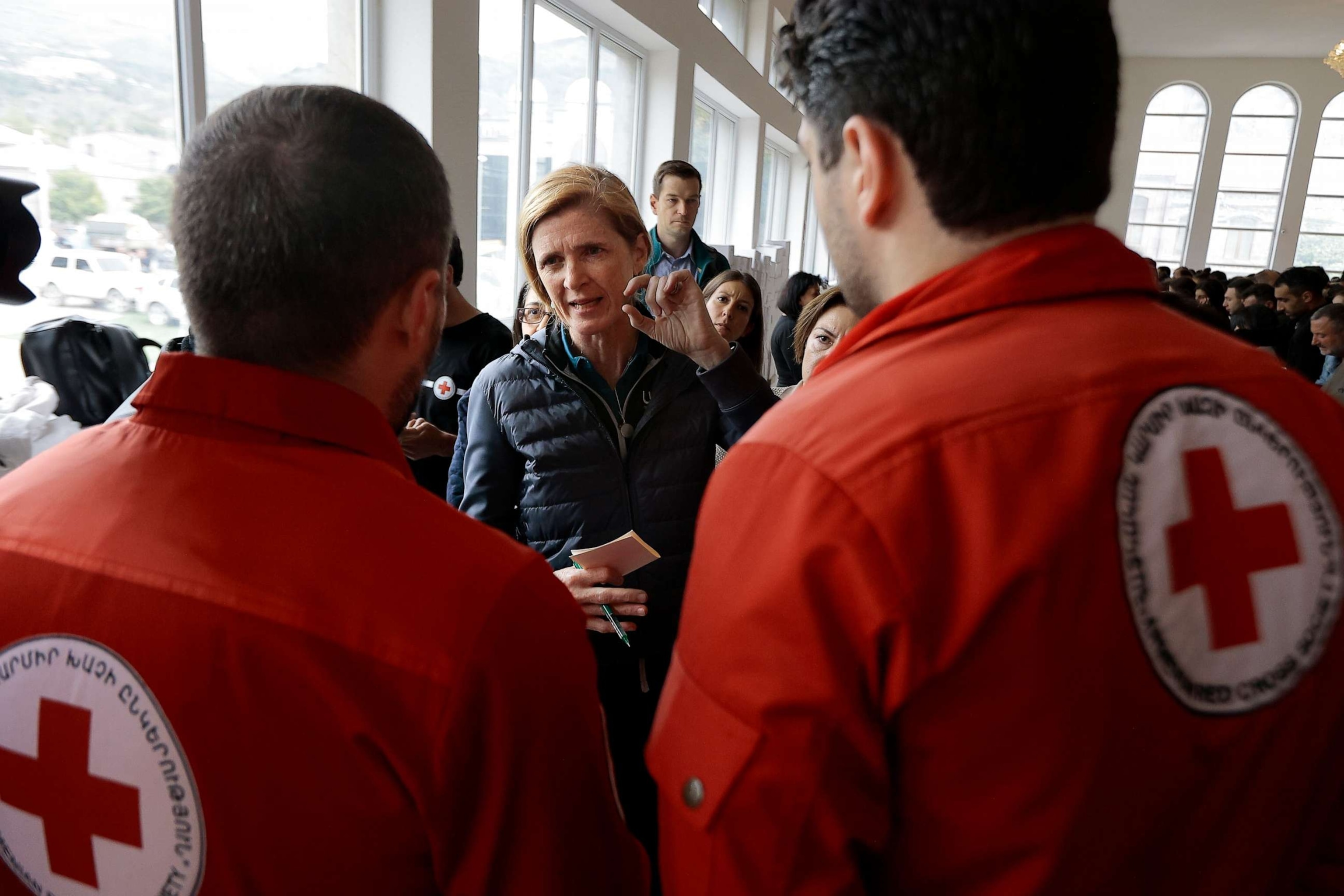 PHOTO: USAID Samantha Power, center, speaks to the Red Cross members while visiting ethnic Armenians from Nagorno-Karabakh at a temporary camp in Armenia's Goris in Syunik region, Armenia, on Tuesday, Sept. 26, 2023.