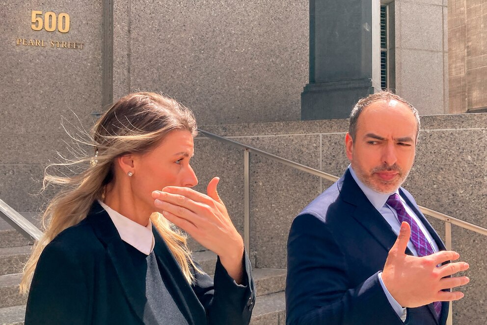 PHOTO: Aimee Harris, left, walks out of Manhattan federal court, April 9, 2024, in New York.