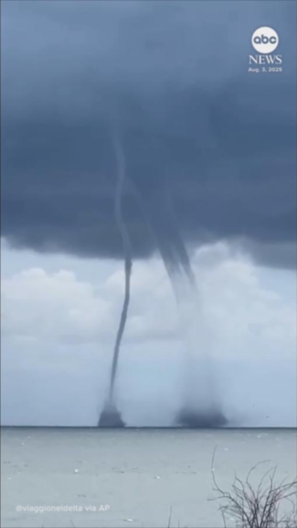 NextImg:Video Twin waterspouts swirl side by side off coast of northern Italy