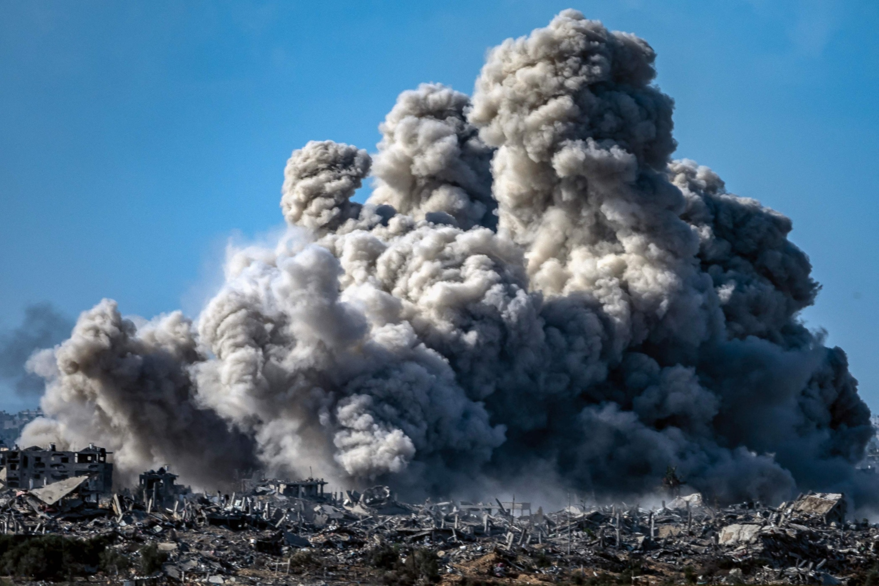 PHOTO: A picture taken from a position near Sderot along the Israeli border with the Gaza Strip shows smoke billowing during an Israeli bombardment on the northern Palestinian territory on Nov. 21, 2023.