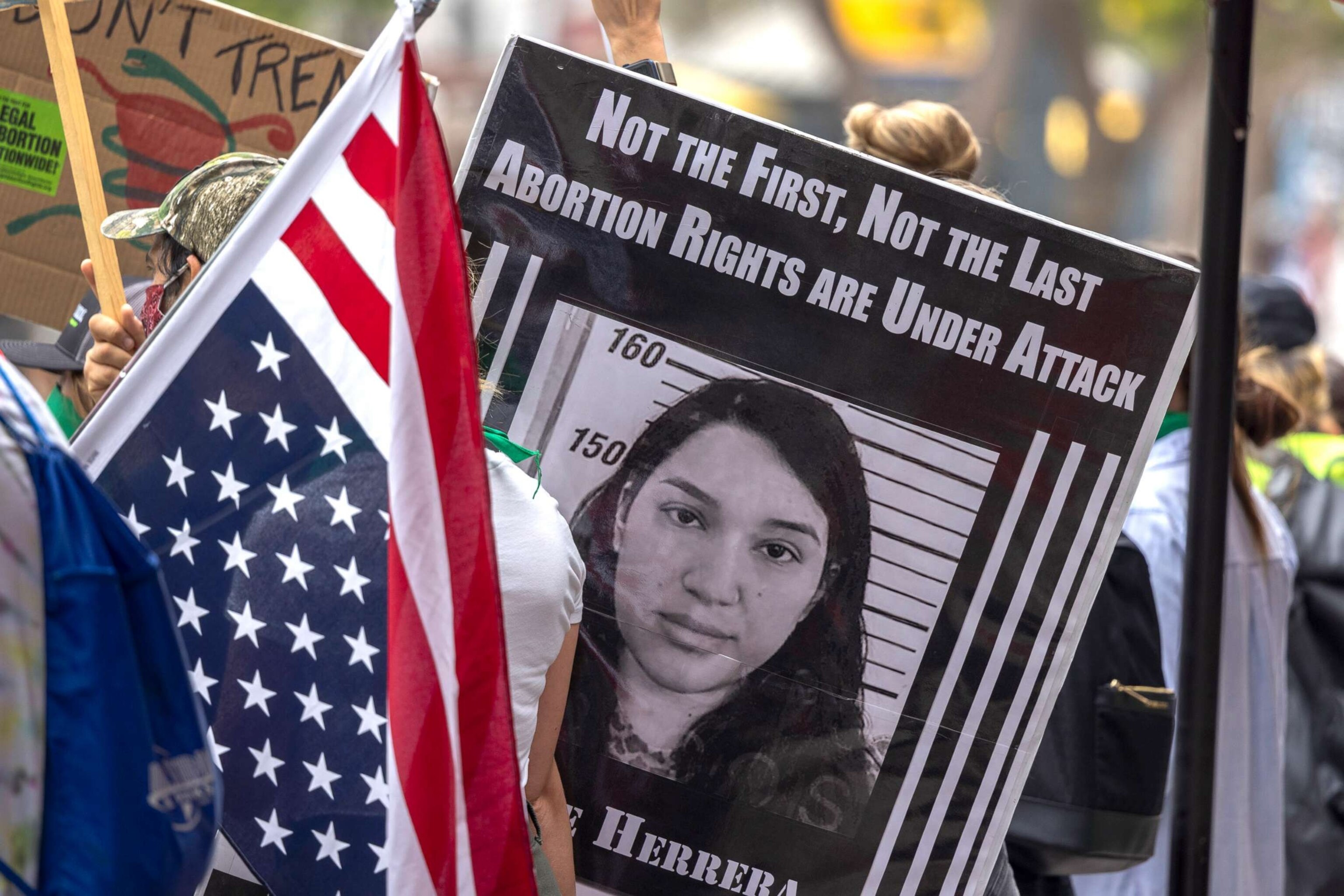 PHOTO: A photo of Lizelle Herrera is carried during a protest march denouncing the Supreme Court decision to end abortion rights protections, on July 16, 2022 in Santa Monica, Calif. Herrera was charged with murder for allegedly self-inducing an abortion.