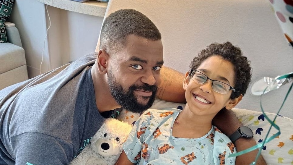 Father and son spending Christmas together after health scares