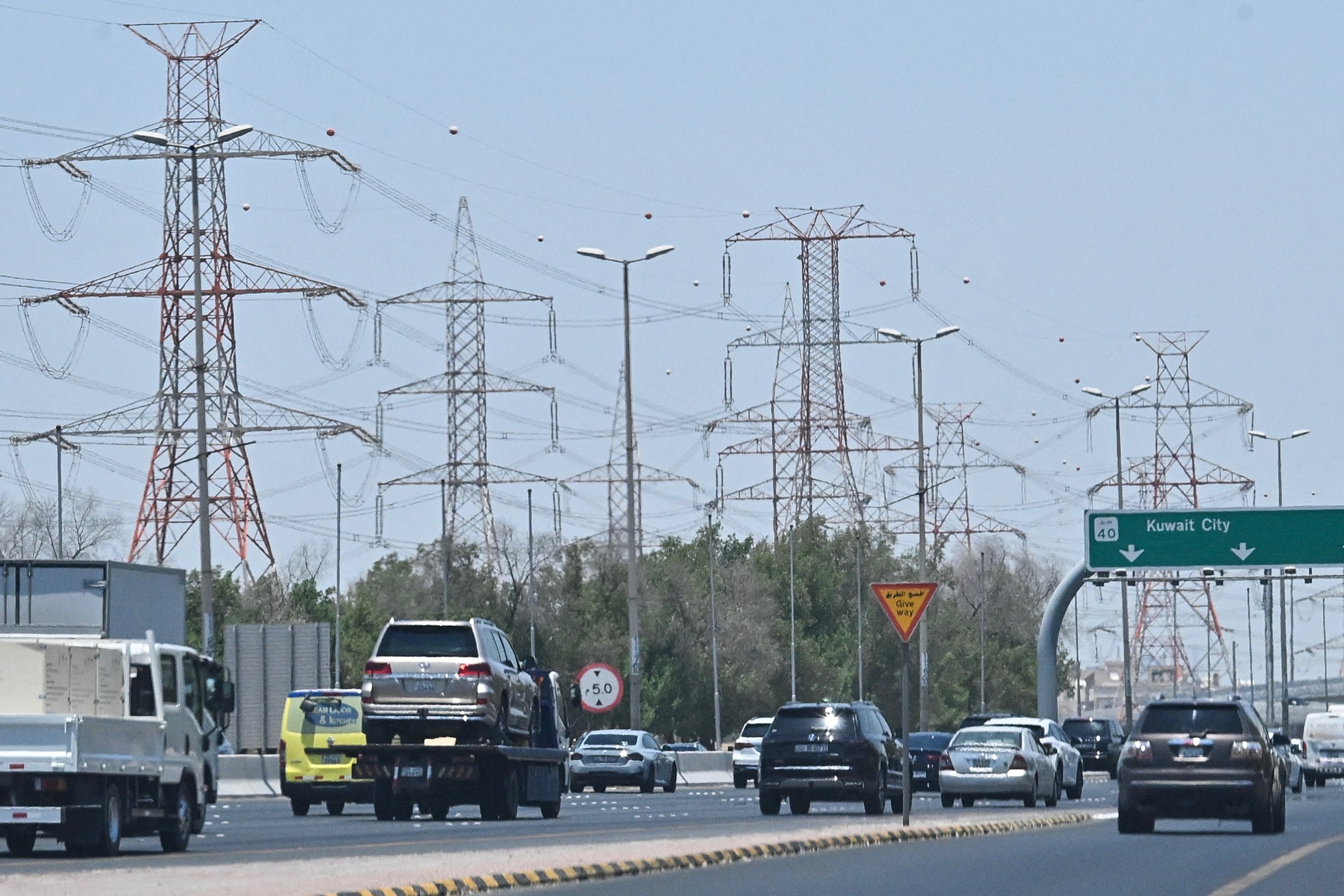 PHOTO: Vehicles drive along a highway on the outskirts of Kuwait City on July 8, 2026.