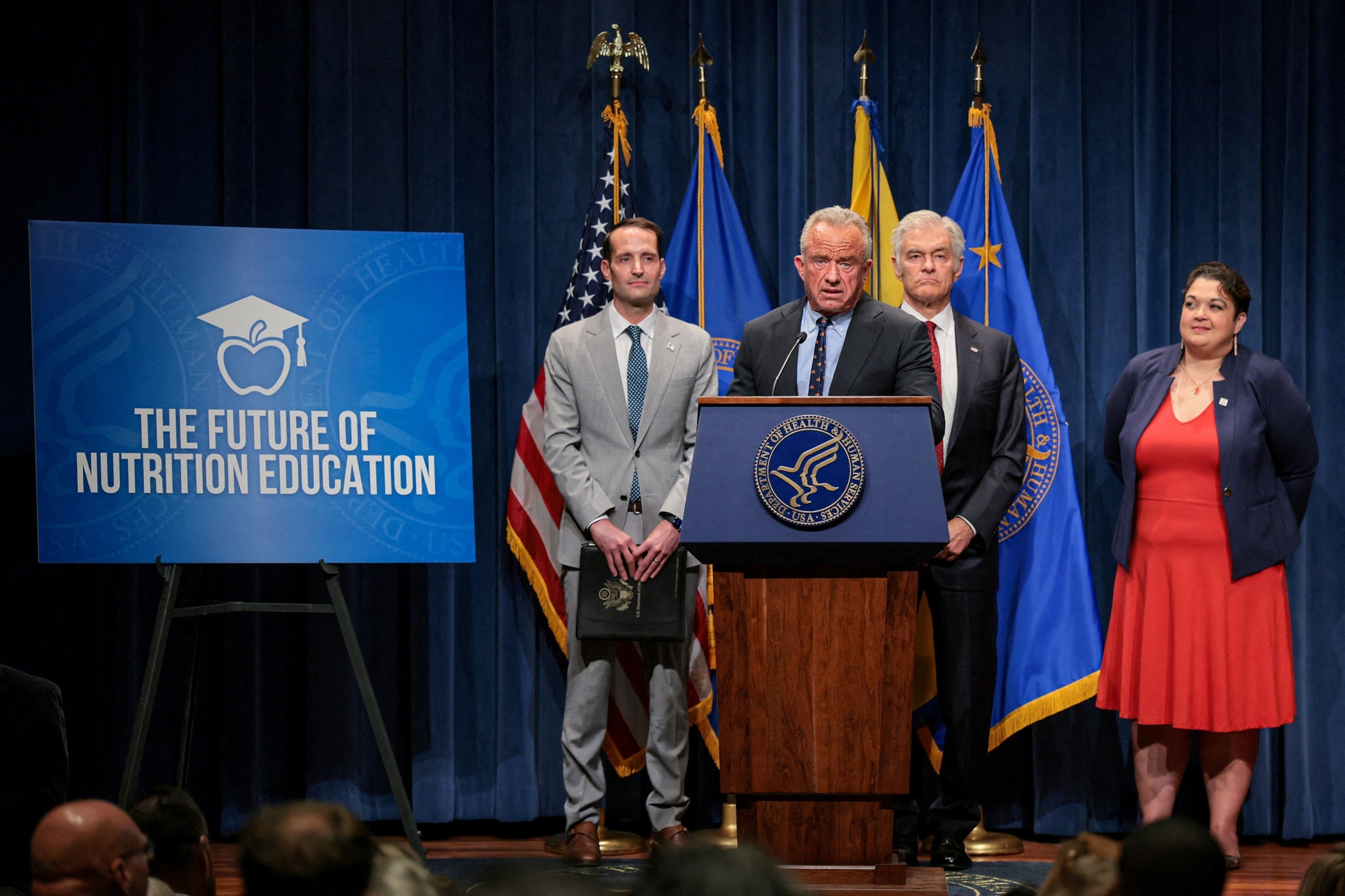 PHOTO: Secretary of Health and Human Services (HHS) Robert F. Kennedy Jr., standing next to Under Secretary of Education Nicholas Kent, at the Department of Health and Human Services in Washington, D.C., June 8, 2026. 