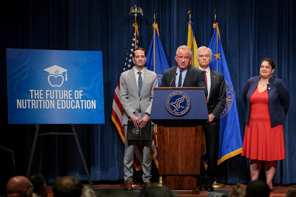 PHOTO: Secretary of Health and Human Services (HHS) Robert F. Kennedy Jr., standing next to Under Secretary of Education Nicholas Kent, at the Department of Health and Human Services in Washington, D.C., June 8, 2026. 