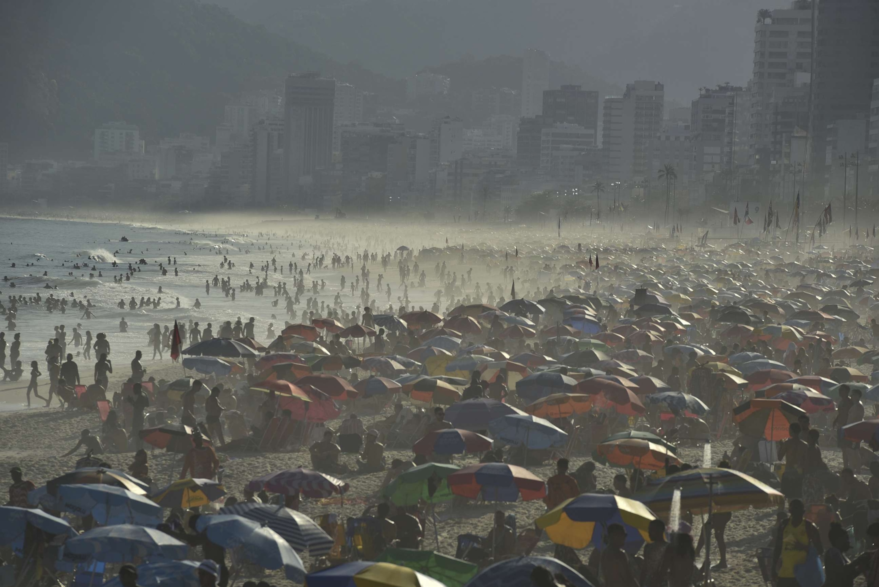 PHOTO: People refresh themselves on the Ipanema beach, as temperatures soar is in the middle of the winter season in Rio De Janeiro, Brazil, Aug. 23, 2023.