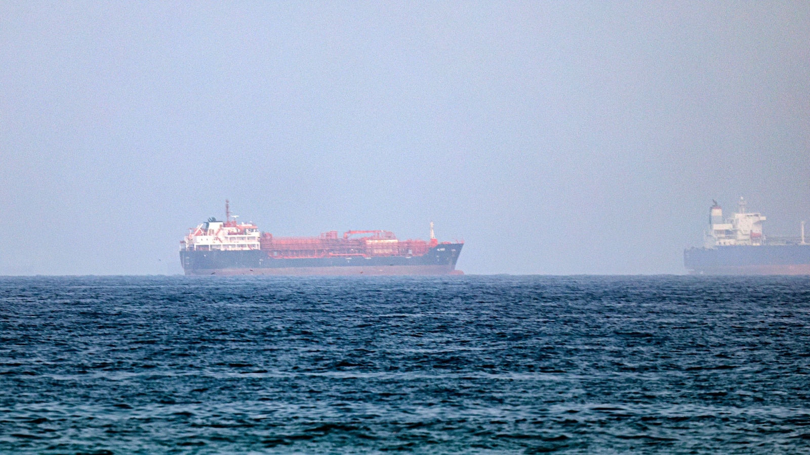 Oil prices on Wednesday climbed to their highest level in more than a month as fighting in the Middle East escalated and a top U.S. official voiced pessimism ab
