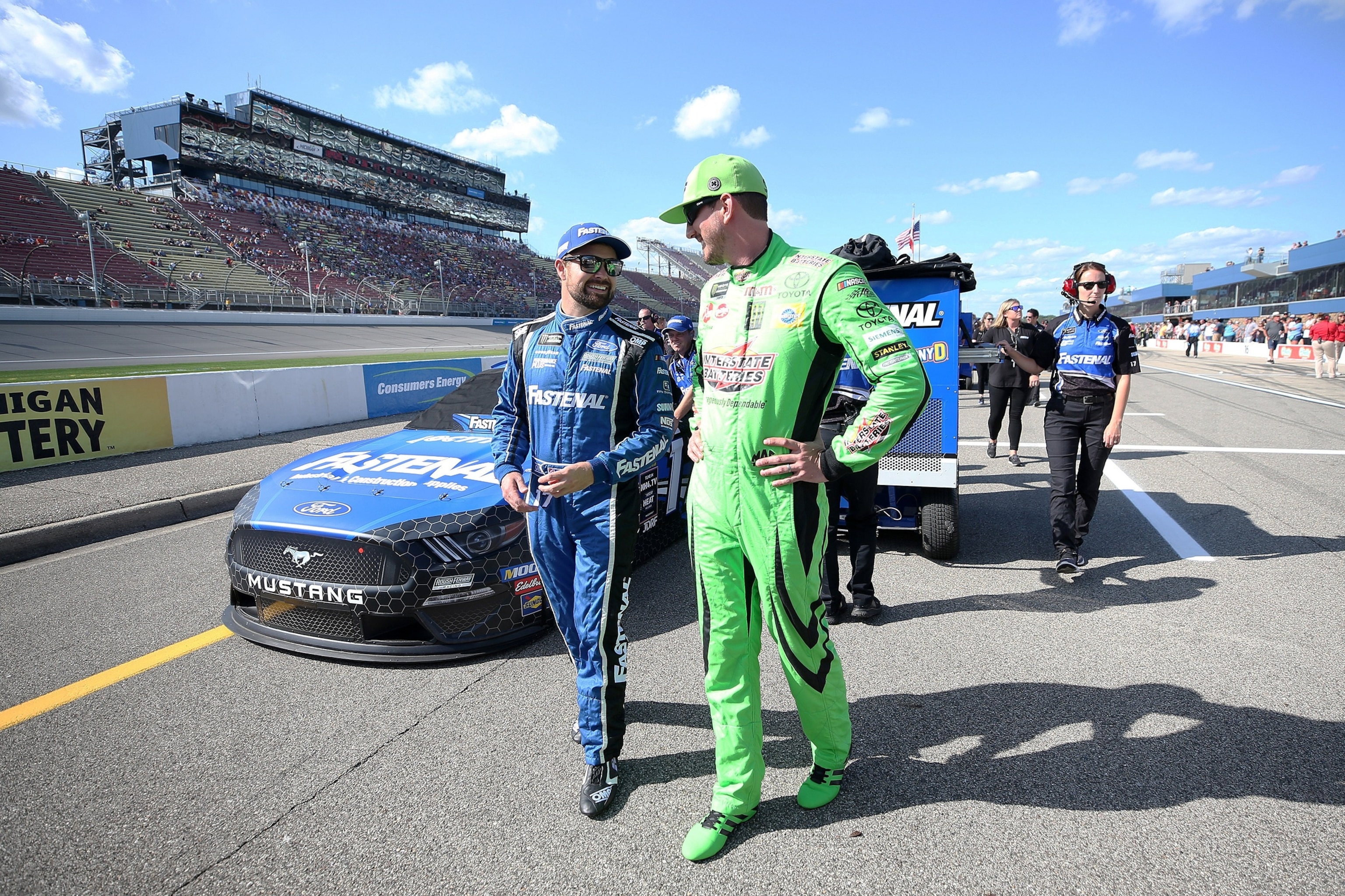 PHOTO: Ricky Stenhouse Jr., talks with Kyle Busch during qualifying for the Monster Energy NASCAR Cup Series Consumers Energy 400 at Michigan International Speedway, on Aug. 9, 2019, in Brooklyn, Michigan.