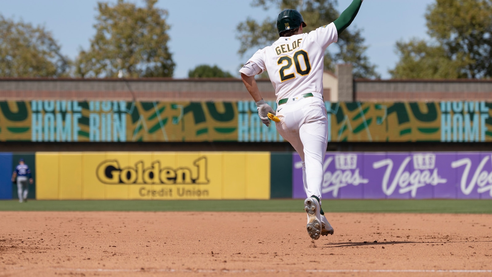 Power Surge Lifts A's Past Rangers, Ends Home Series Slump