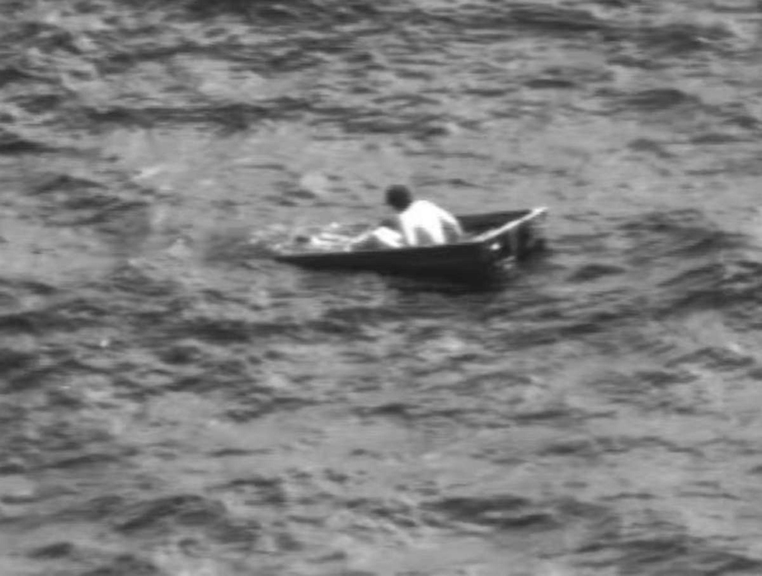 PHOTO: The U.S. Coast Guard released footage of the rescue of a man from a partially submerged boat 12 miles offshore of St. Augustine, Florida, on Aug. 5, 2023.