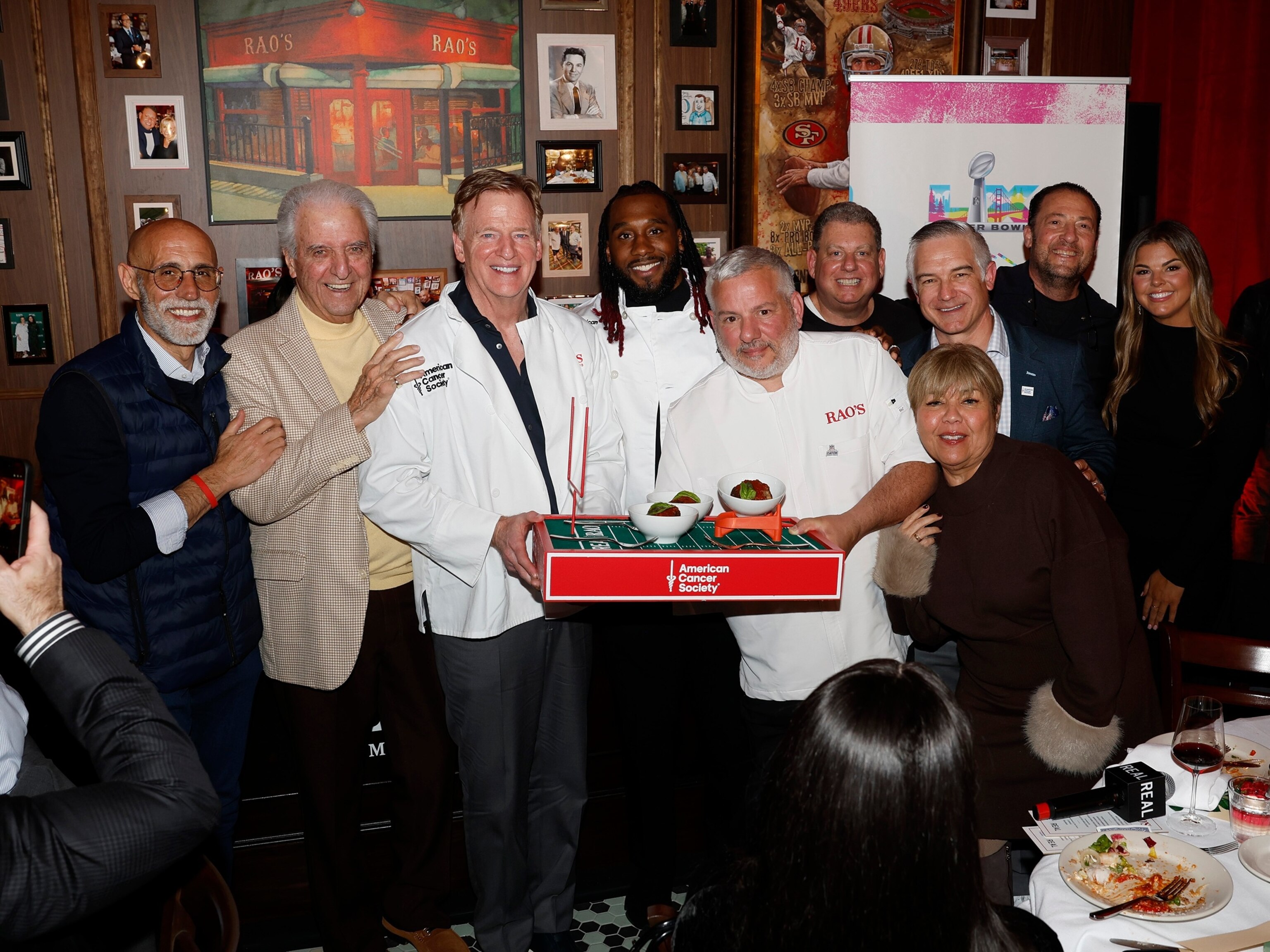 PHOTO: Rao's pop-up in San Francisco for Super Bowl LX with Frank Pellegrino Jr, Ron Straci, Roger Goodell, Alexander Mattison, Dino Gatto, Gary Spitalnik, Shane Jacobson, Jeri Ramos, Kenny Dichter, and Christina Hovestadt.