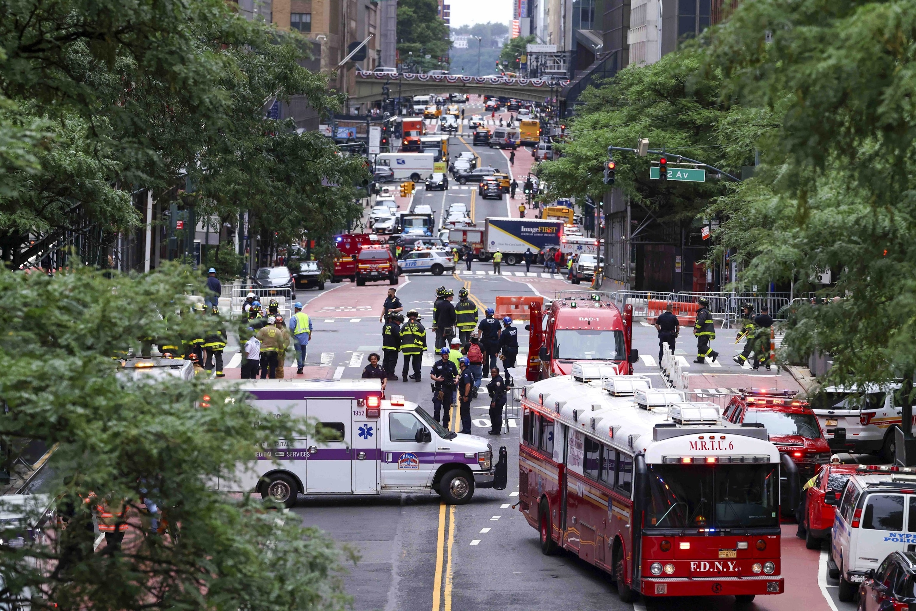 PHOTO: Emergency services respond to a 38-story building under construction in Midtown Manhattan after workers discovered structural support beams beginning to buckle in New York, on July 7, 2026. 