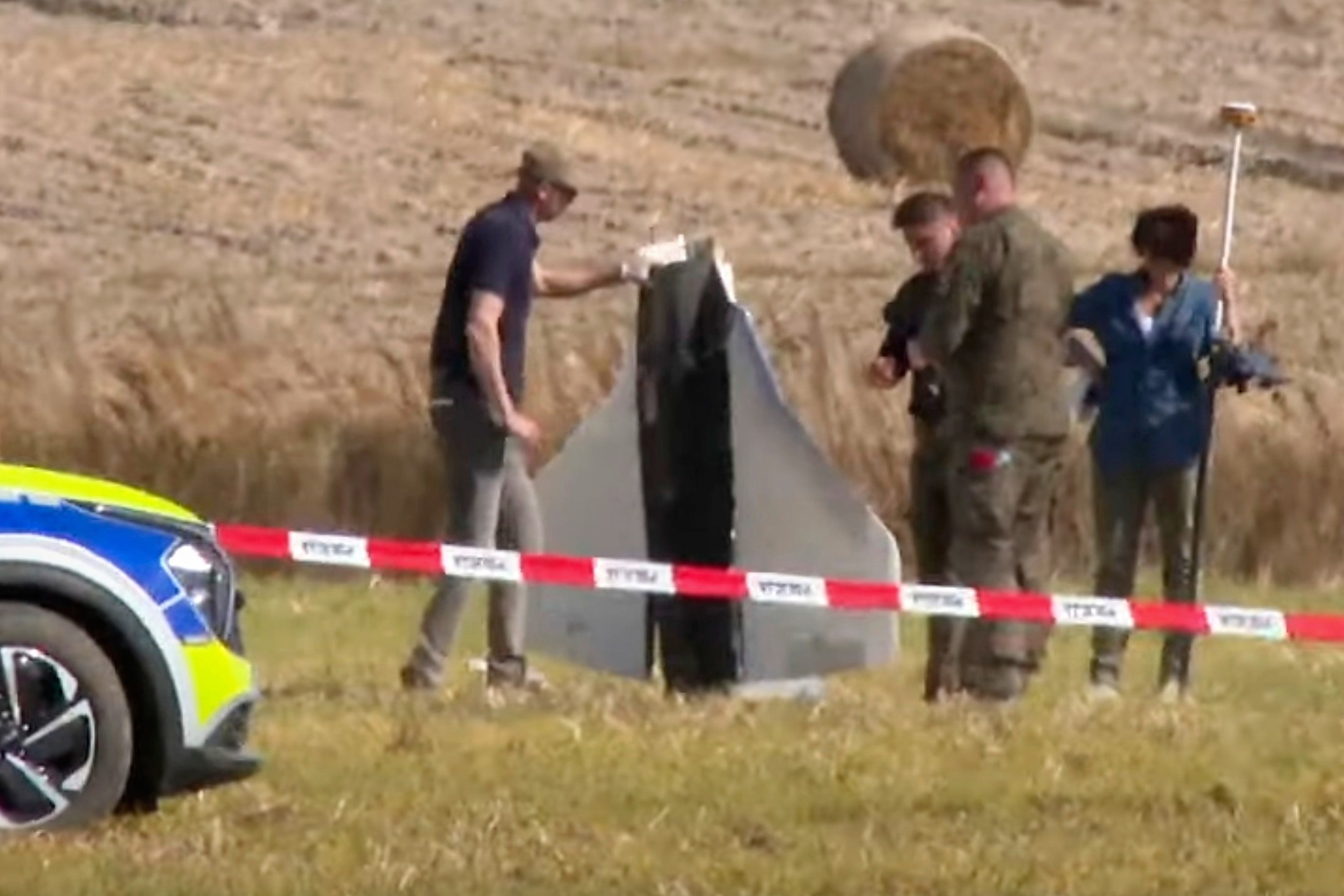 PHOTO: Police and Military Police secure parts of a damaged object shot down by Polish authorities  at a site in Wohyn, Poland, Sept. 10, 2025. 