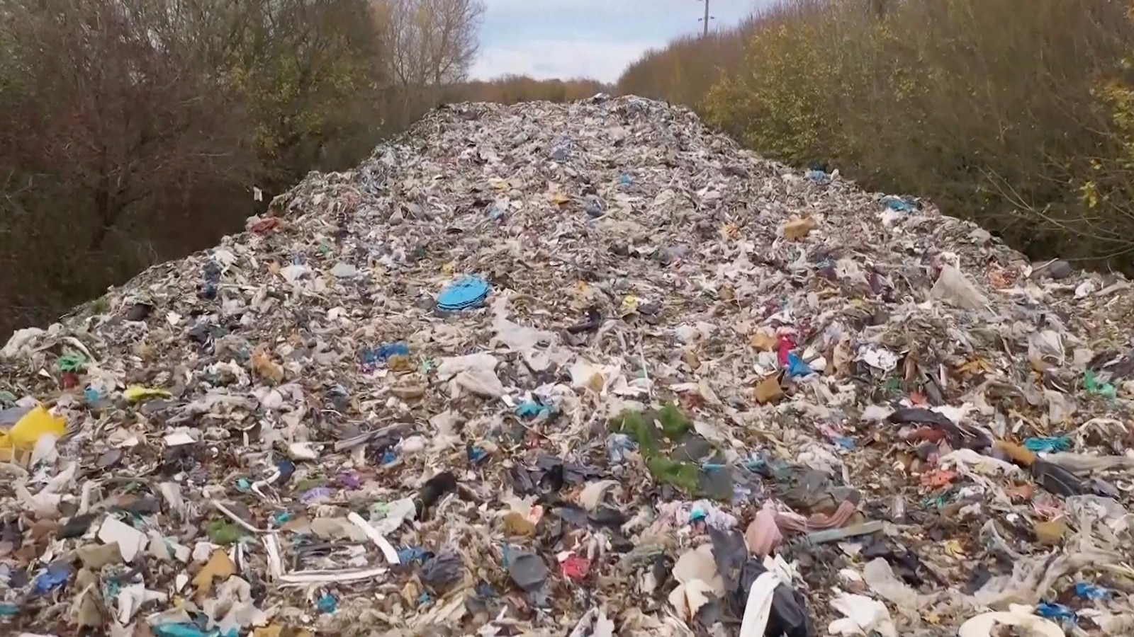 Mountain of illegally dumped trash near Oxford river causes outcry in England