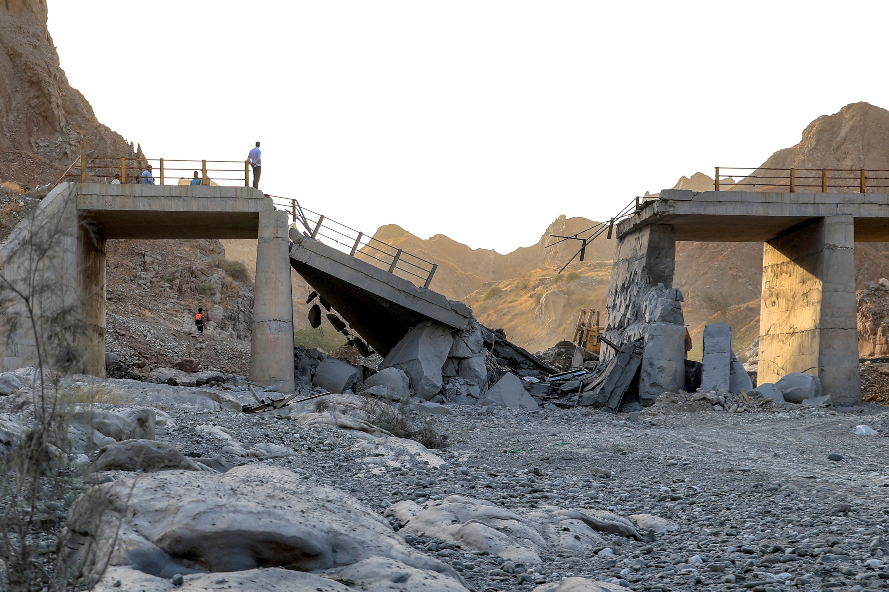 PHOTO: A heavily-damaged bridge which was hit by a US strike is pictured along the road connecting Roudan and Bandar Abbas in southern Iran, on July 18, 2026.