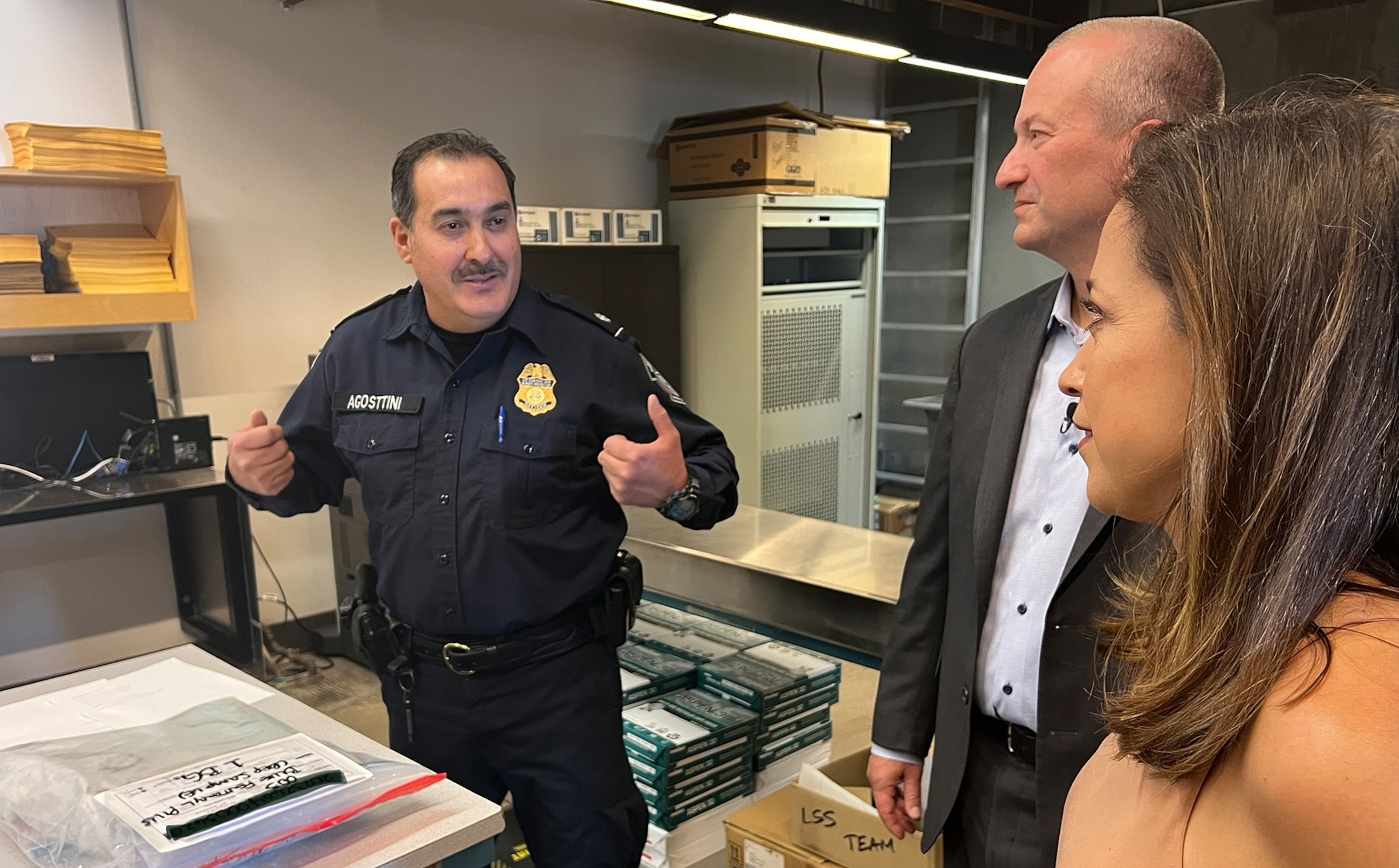 PHOTO: U.S. Customs and Border Protection Seized Property Chief Louis Agosttini, Acting Commissioner Troy Miller and ABC's Mireya Villarreal discuss drug and weapons seizures outside an evidence vault, Nov. 6, 2023.