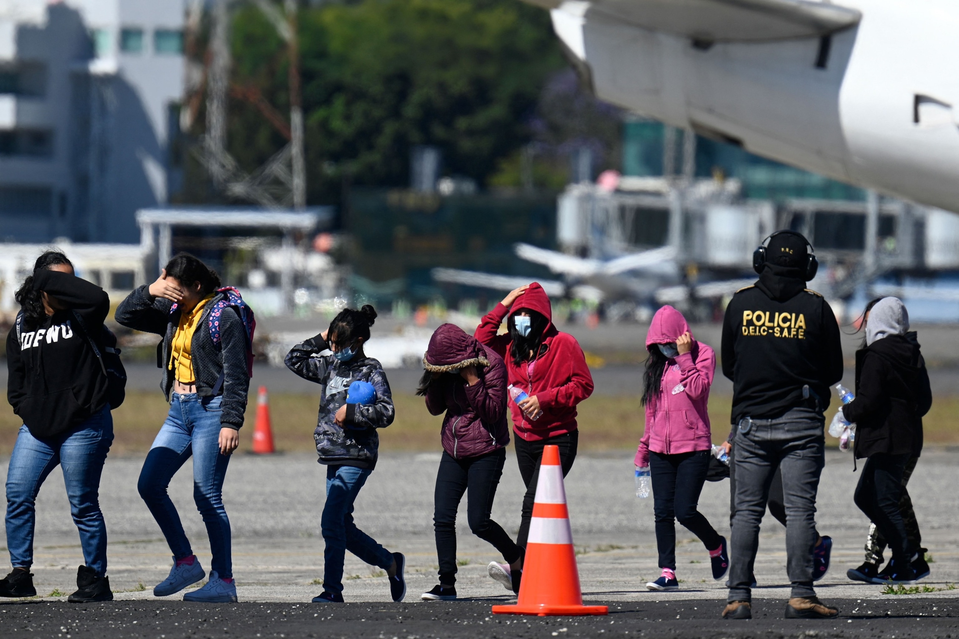 PHOTO: In this Feb. 7, 2023, file photo, part of a group of 92 unaccompanied Guatemalan migrant minors who were deported from Mexico arrive to their country at the Air Force Base in Guatemala City.