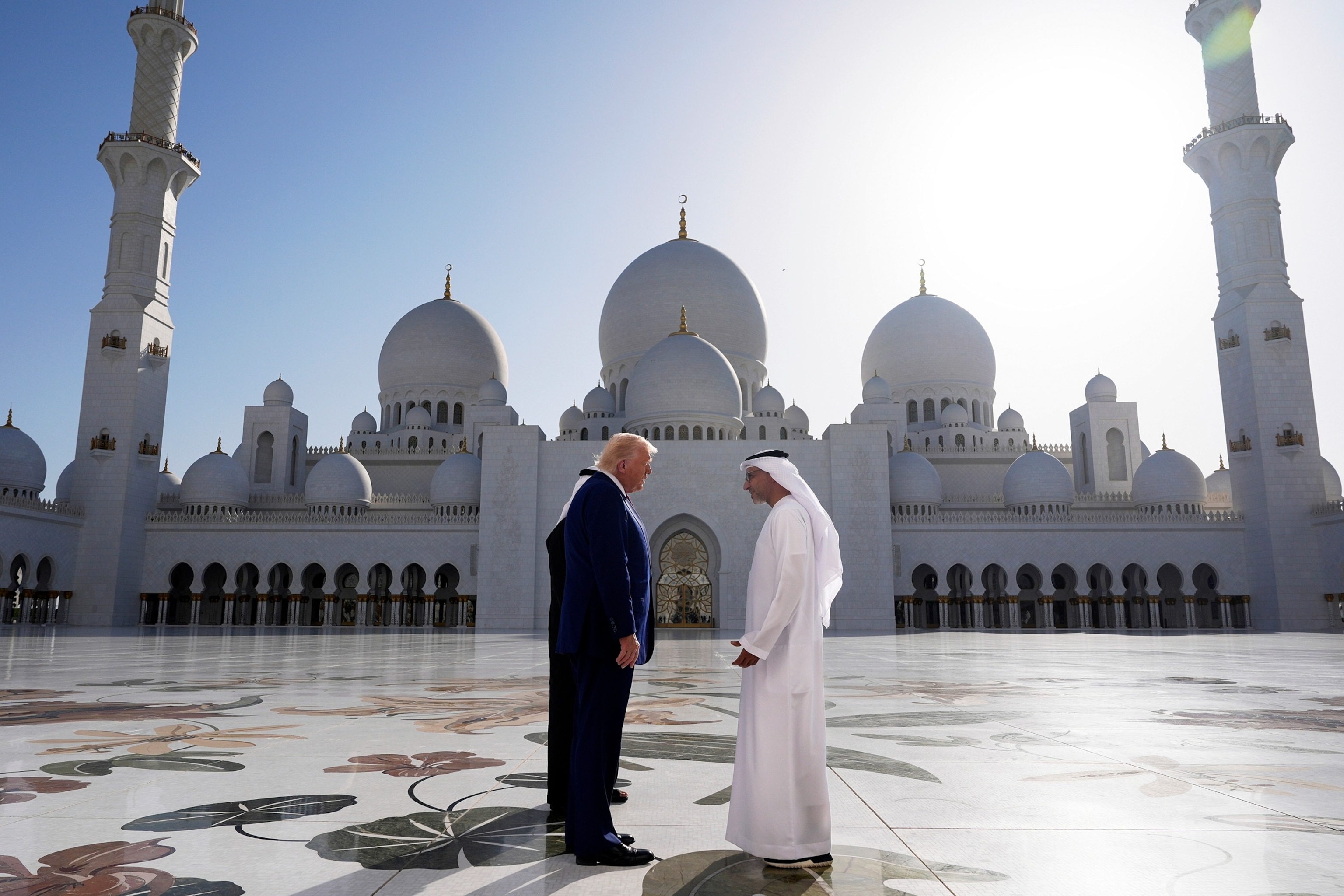 PHOTO: President Donald Trump speaks to Yousif Al Obaidli, director of Sheikh Zayed Grand Mosque, as he tours along with UAE President Mohammed bin Zayed Al Nahyan, left, the Sheikh Zayed Grand Mosque, May 1
