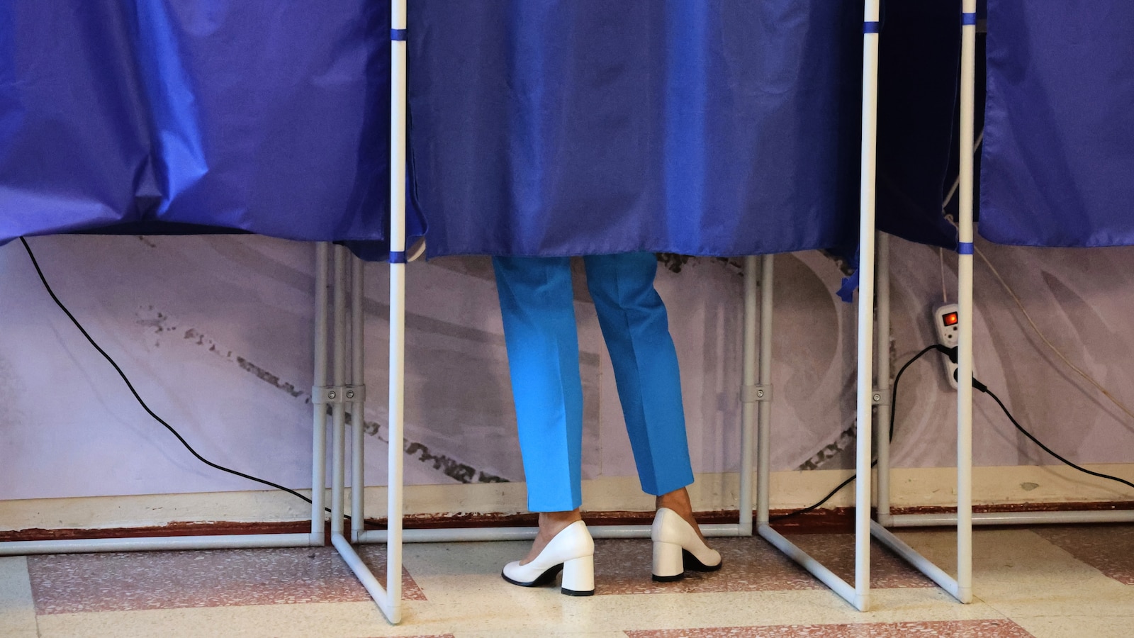 Main Kremlin party keeps control of Russia’s parliament after orchestrated vote